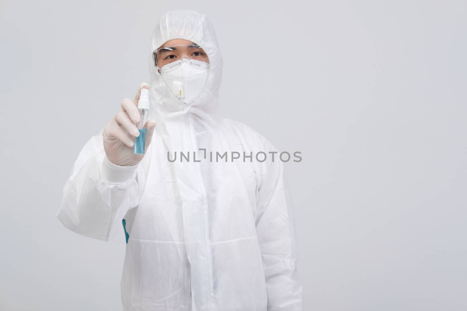 man scientist wearing biological protective uniform suit clothin by pp99