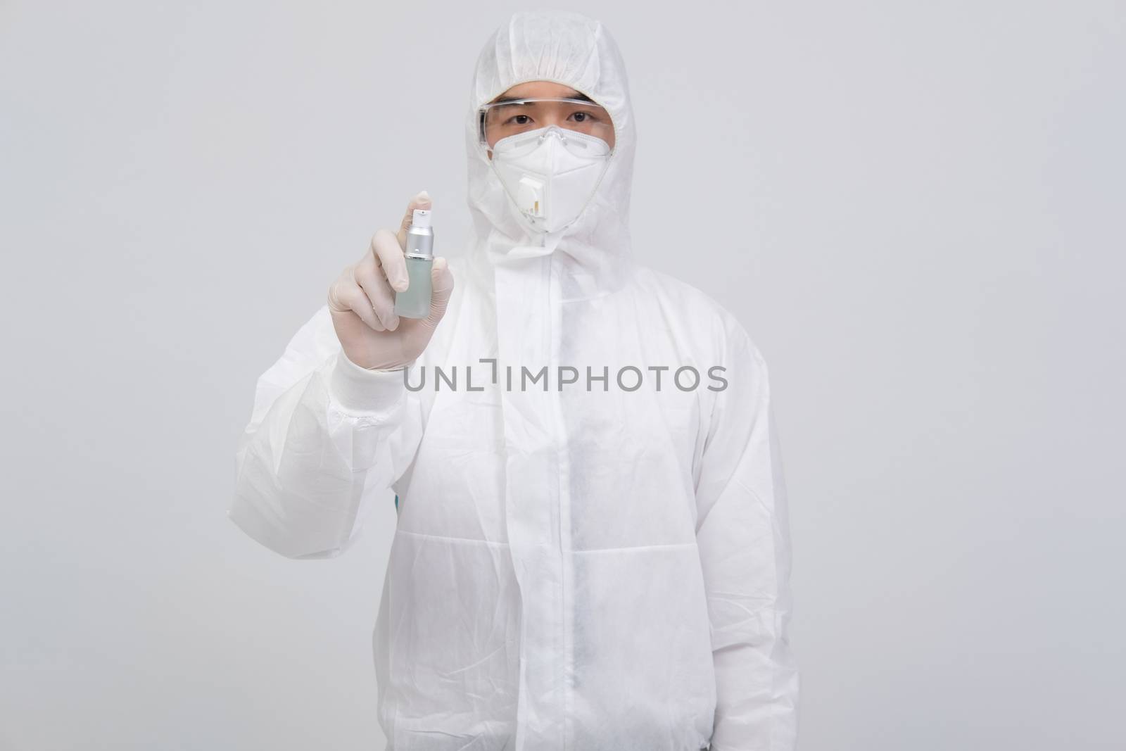 man scientist wearing biological protective uniform suit clothin by pp99