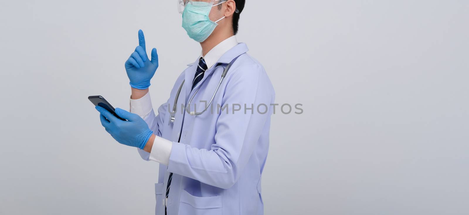 doctor physician practitioner wearing mask with smartphone & stethoscope on white background. medical professional medicine healthcare concept