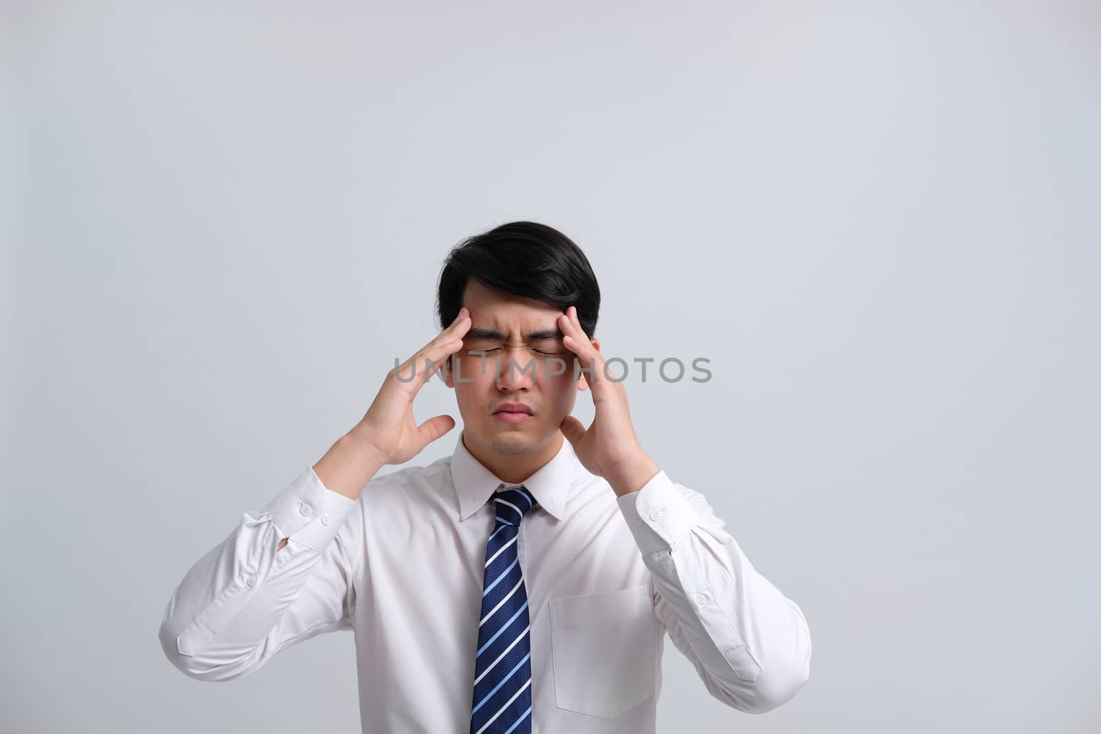 ill businessman man feeling sick, headache from cold flu virus bacteria infection pollution