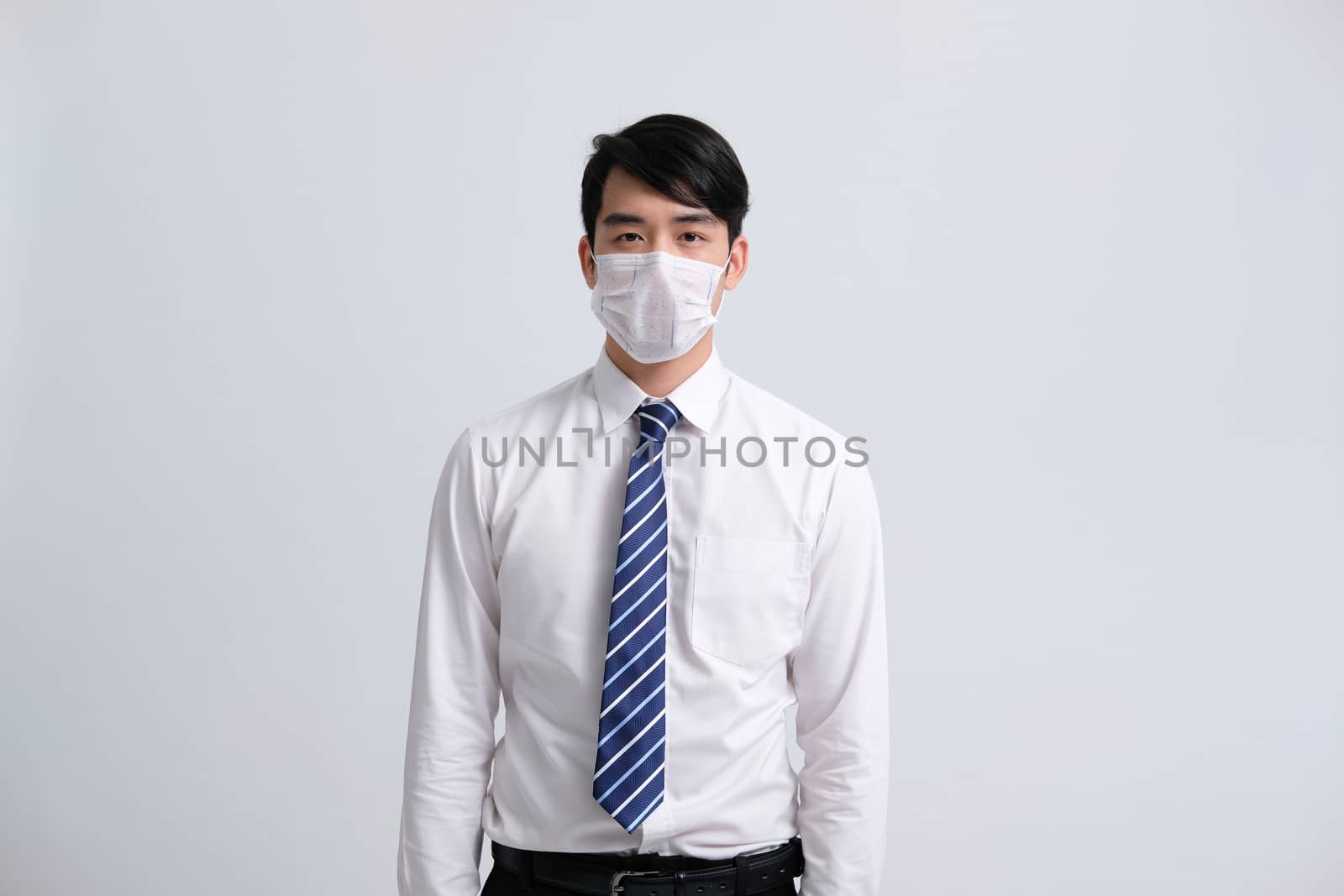 businessman man wearing protective mask against cold flu covid 19 virus bacteria infection pollution