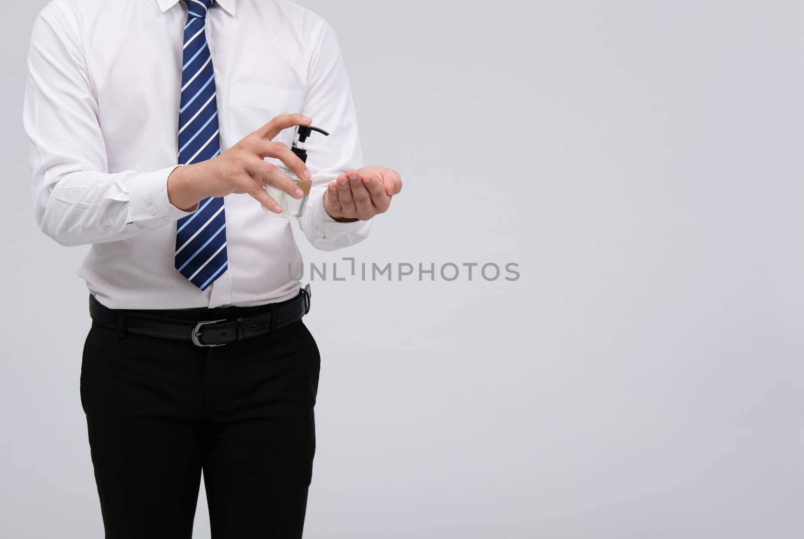 businessman man washing hand with alcohol sanitizer dispenser for sanitizing preventing virus bacteria disease infection. health hygiene