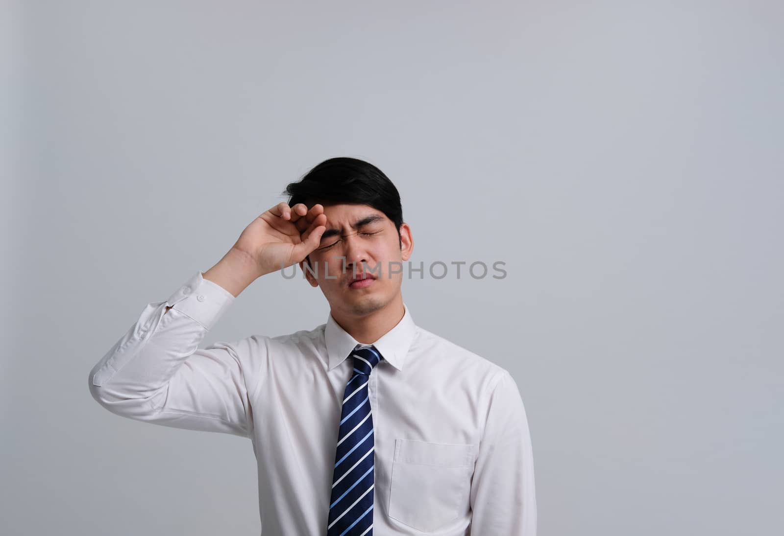 ill businessman man feeling sick, headache from cold flu virus bacteria infection pollution