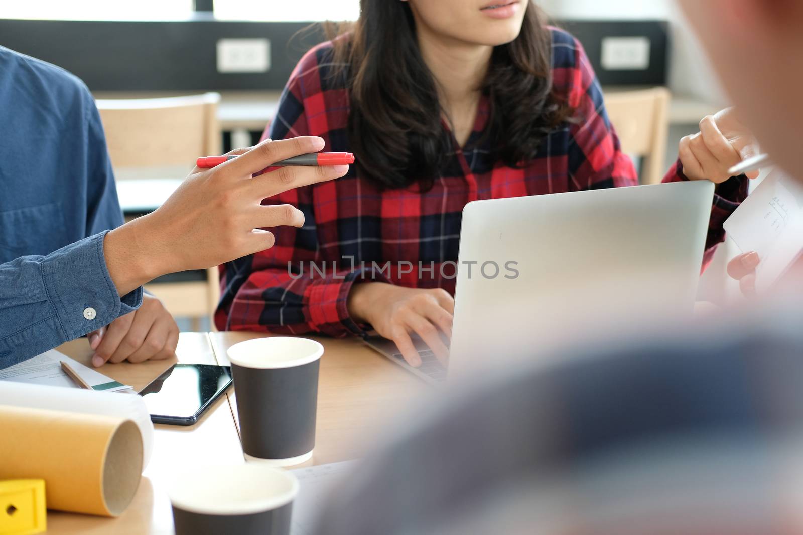 architect engineer interior designer team working discussing on house blueprint of real estate project in meeting. building construction teamwork concept