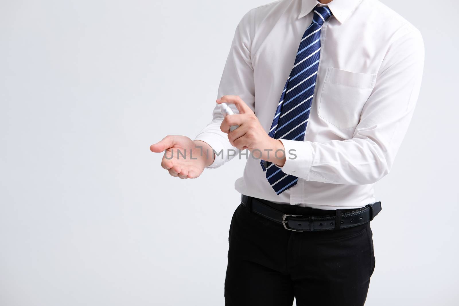 businessman man washing hand with sanitizer dispenser for sanitizing preventing virus bacteria disease infection. health hygiene