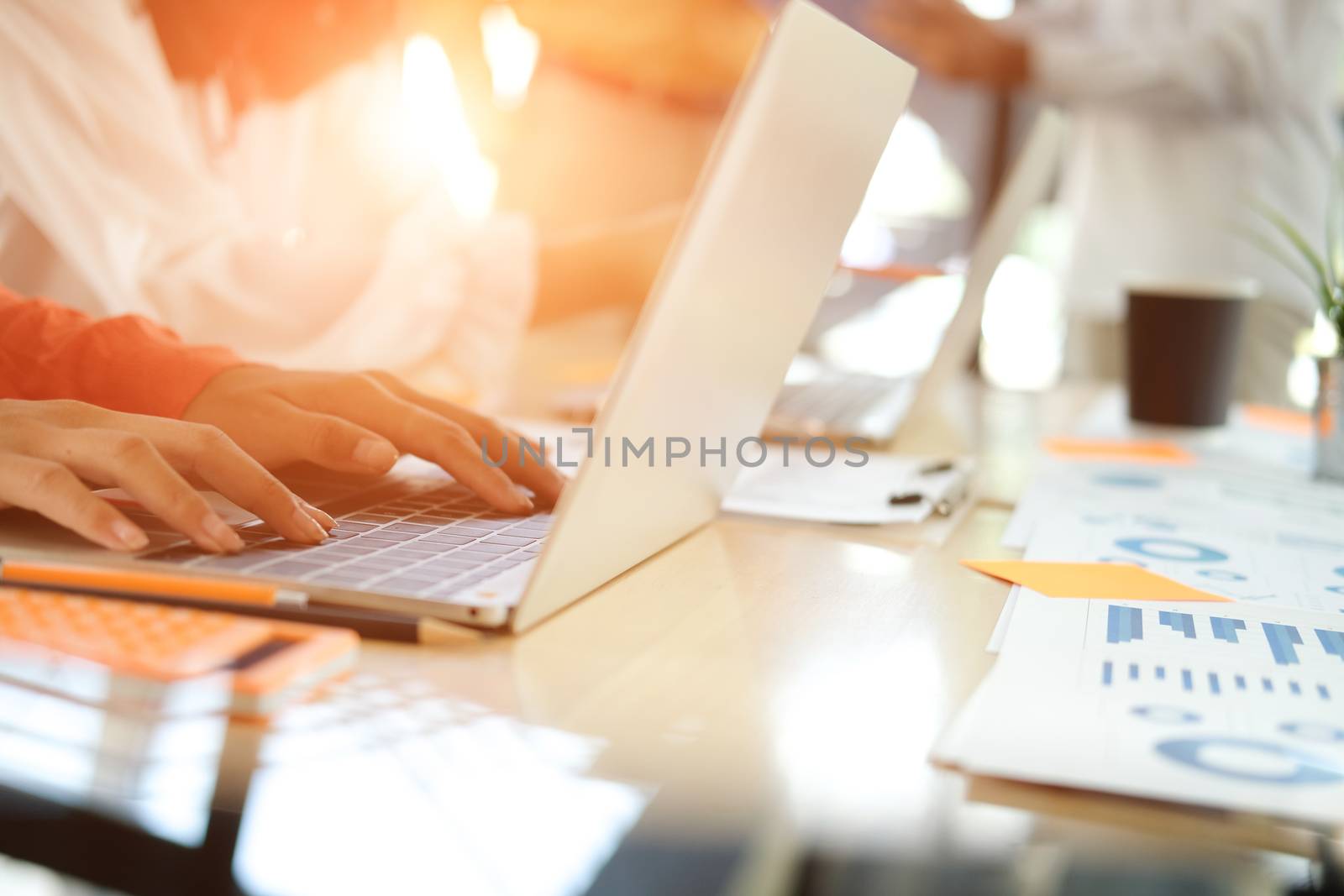 business people discussing on performance revenue in meeting. businessman working with co-worker team. financial adviser analyzing data with investor.