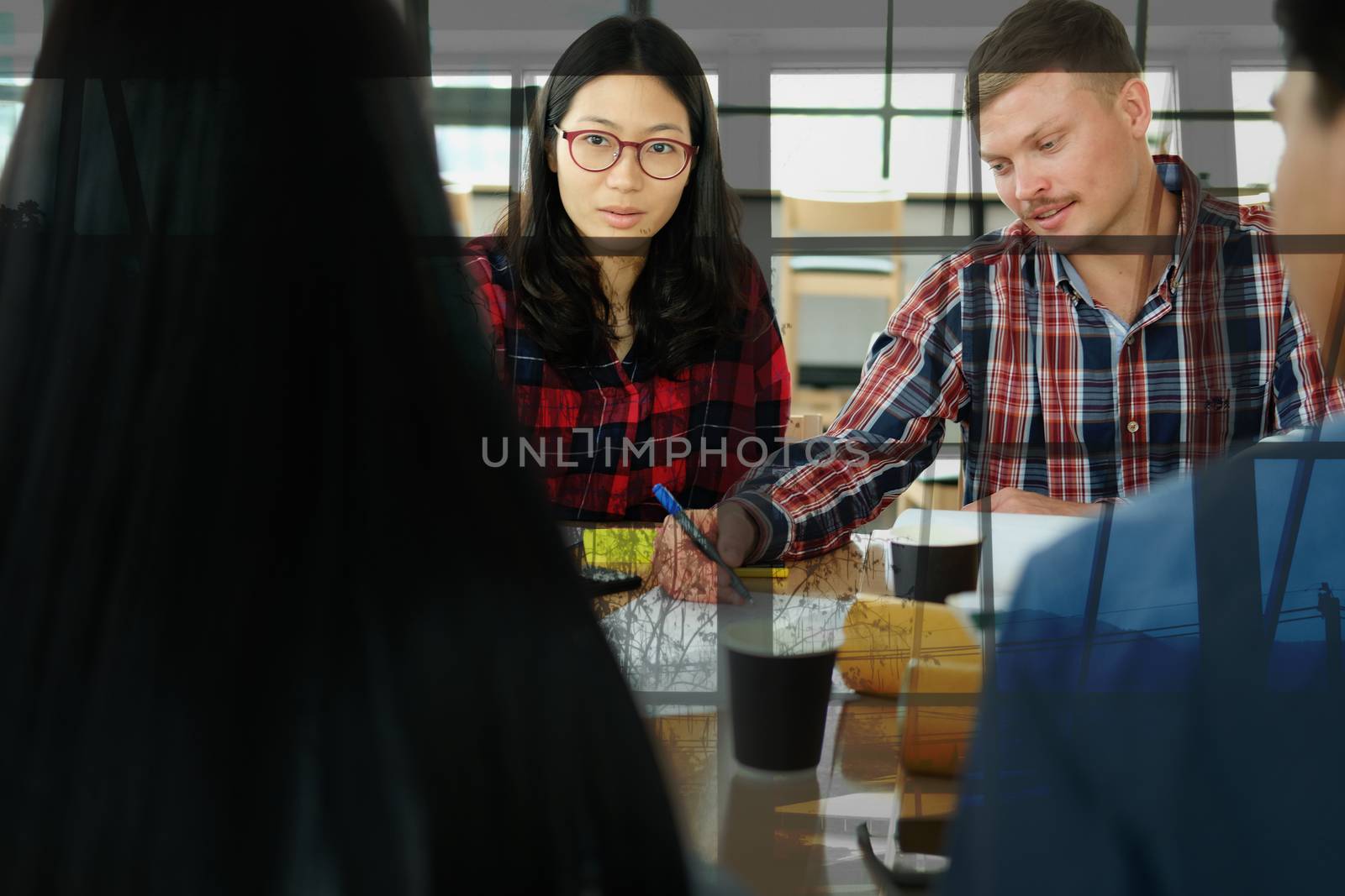 architect engineer interior designer team working discussing on house blueprint of real estate project in meeting. building construction teamwork concept