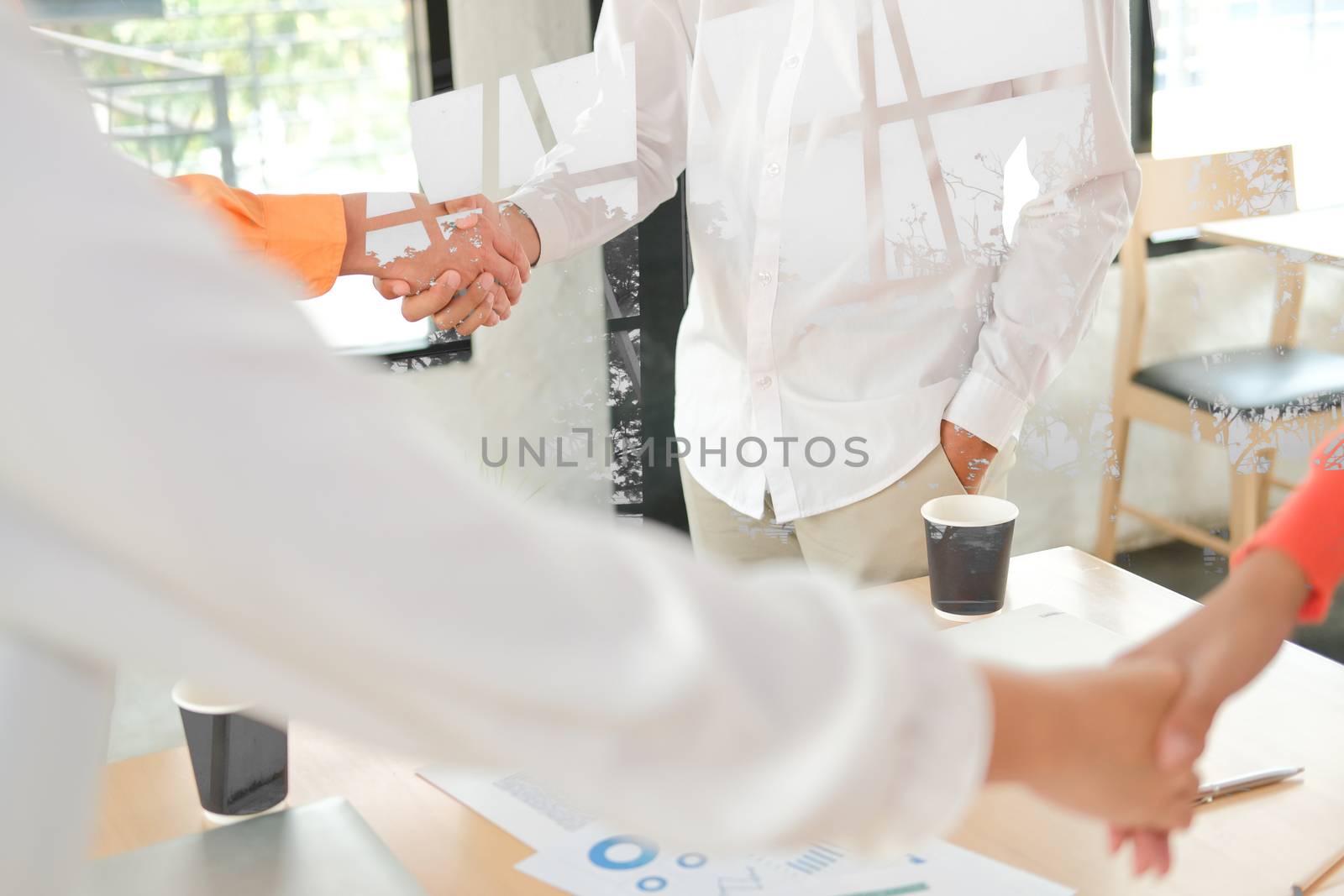 businessman shaking hands after meeting. Business people handshaking. Greeting deal, teamwork partnership concept.