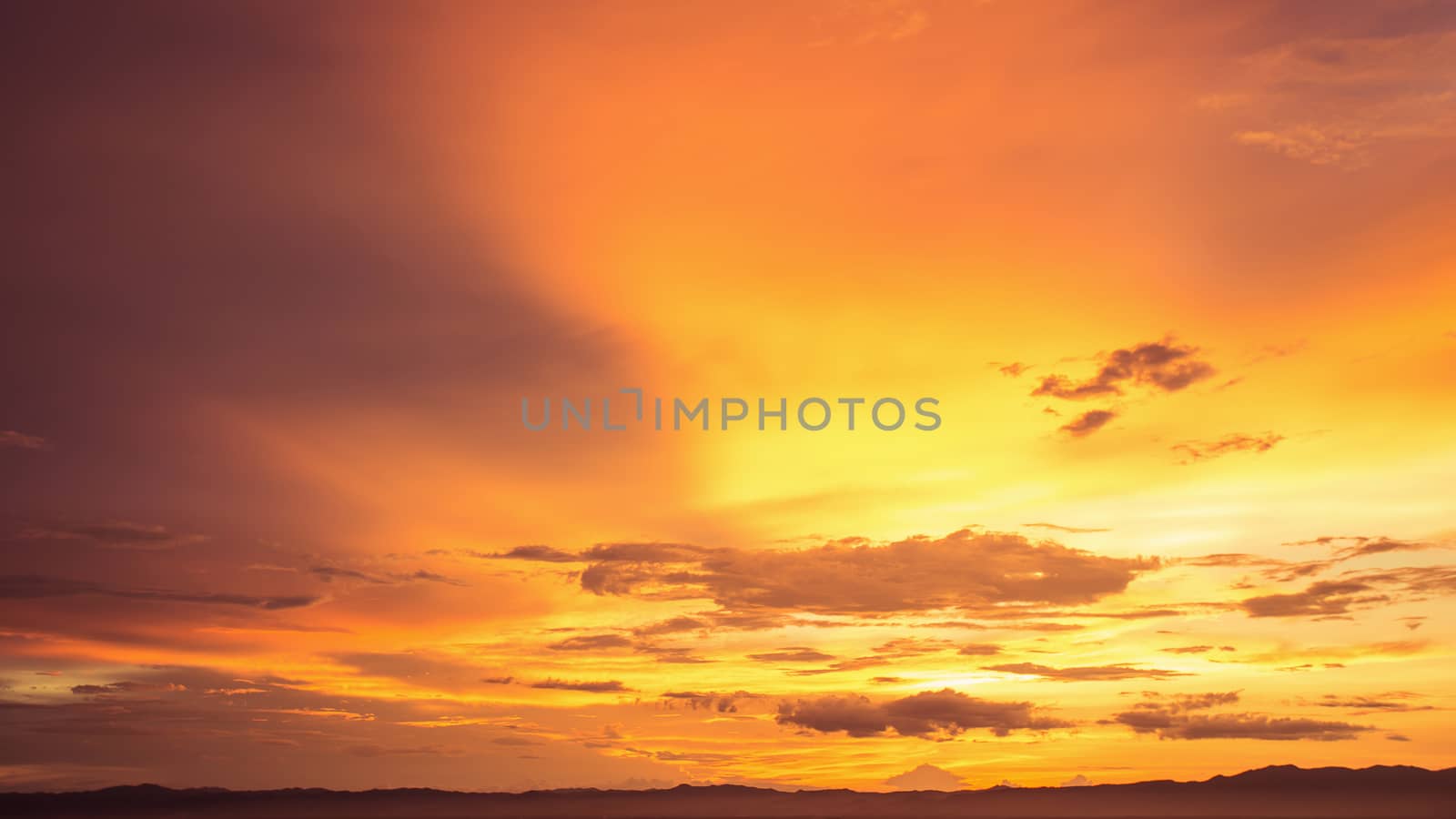 Colorful dramatic sky with cloud at sunset.Sky with sun backgrou by kaiskynet