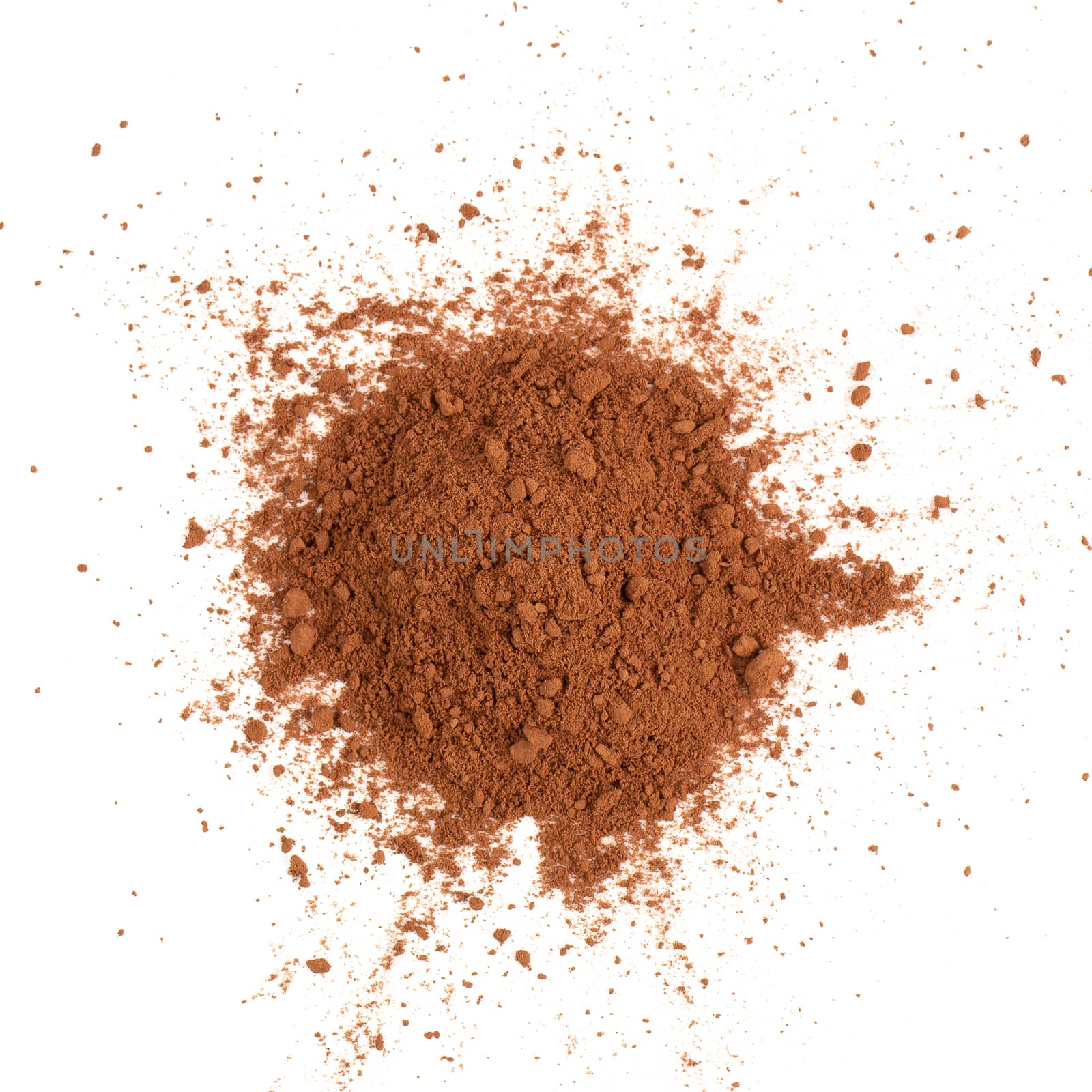 Pile cocoa powder isolated on white background by kaiskynet