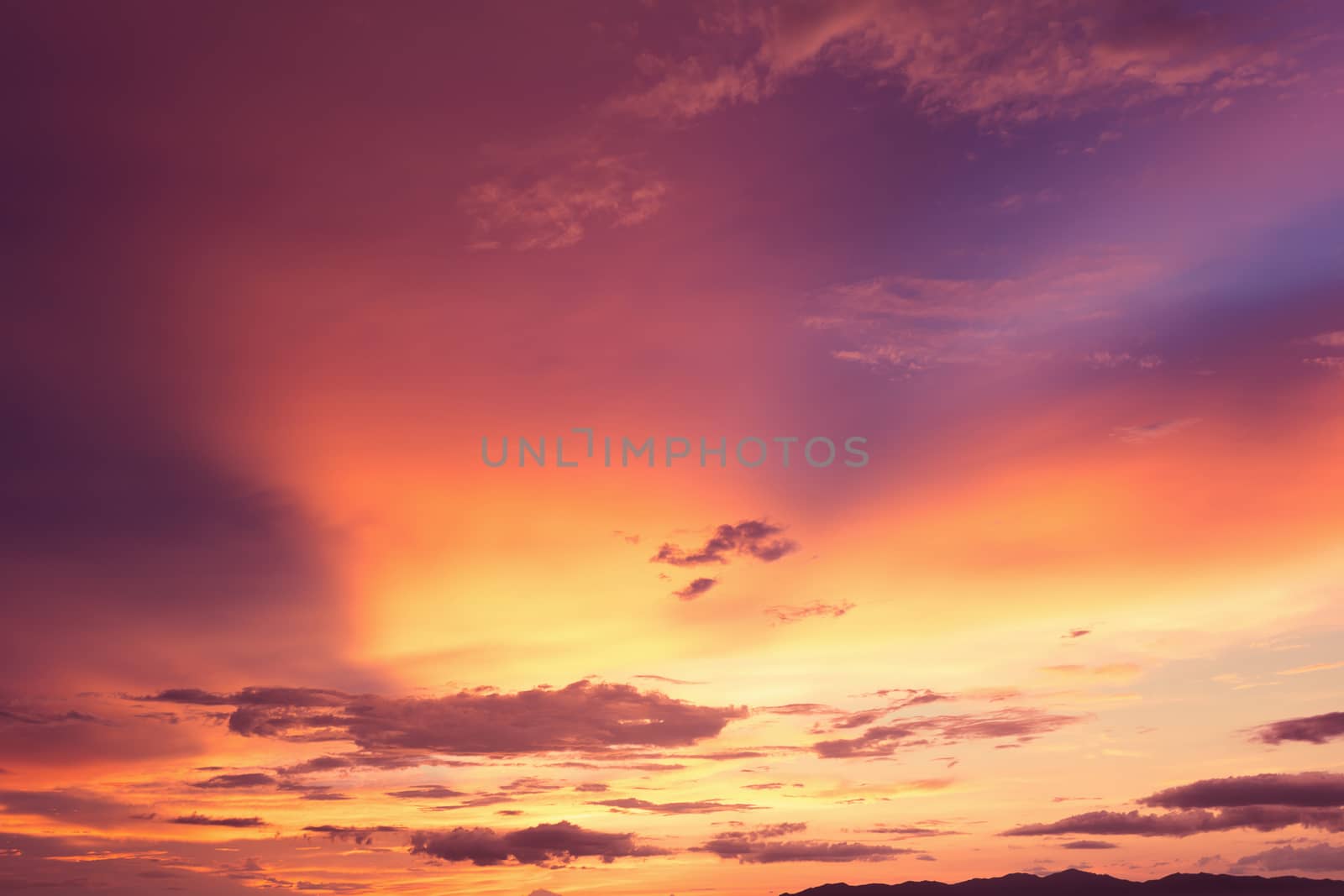 Colorful dramatic sky with cloud at sunset.Sky with sun background.