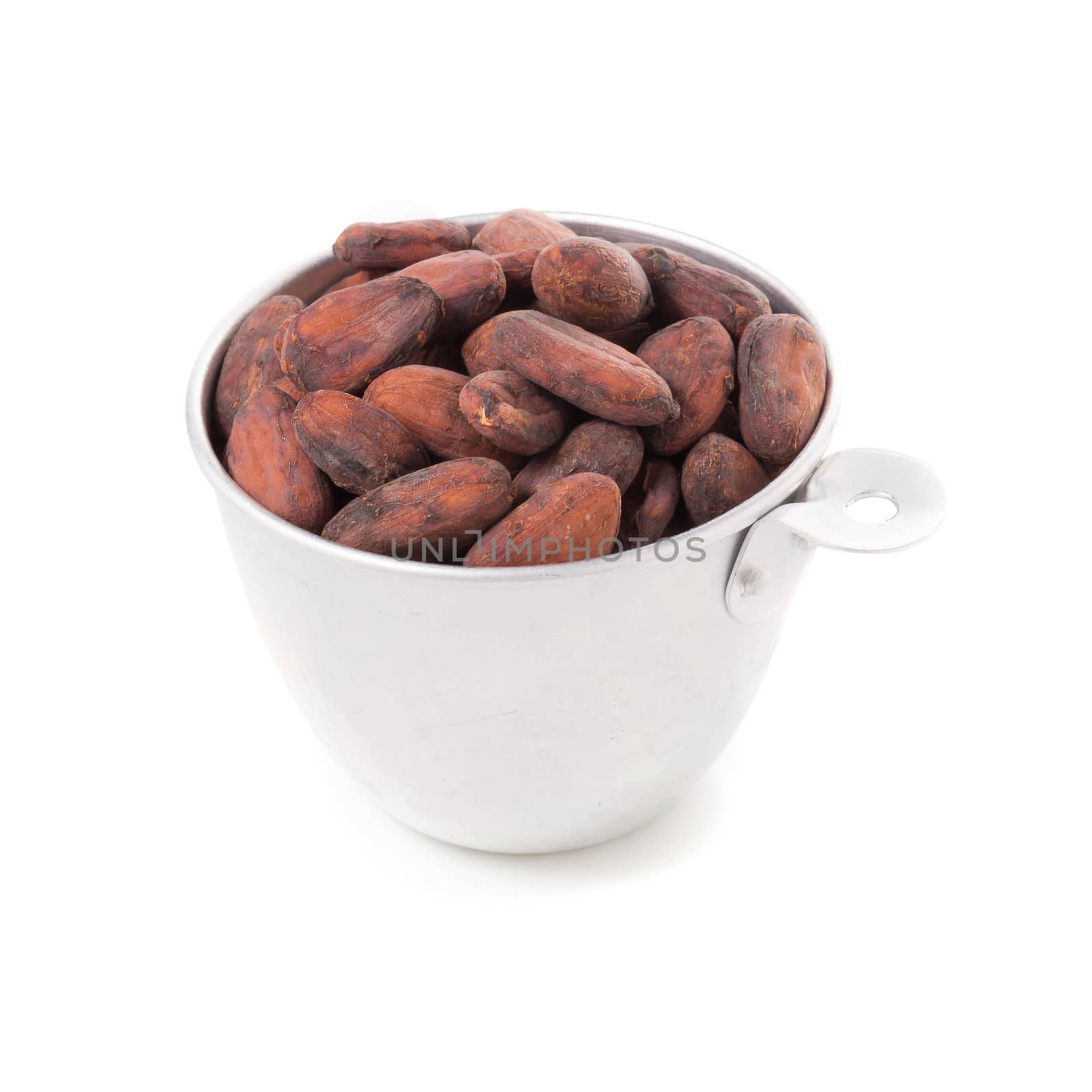 Cocoa fruit, raw cacao beans in cup isolated on a white background.