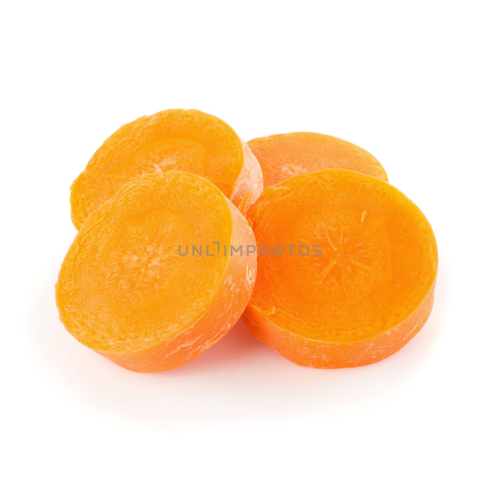 Chopped carrot slices isolated on a white background.