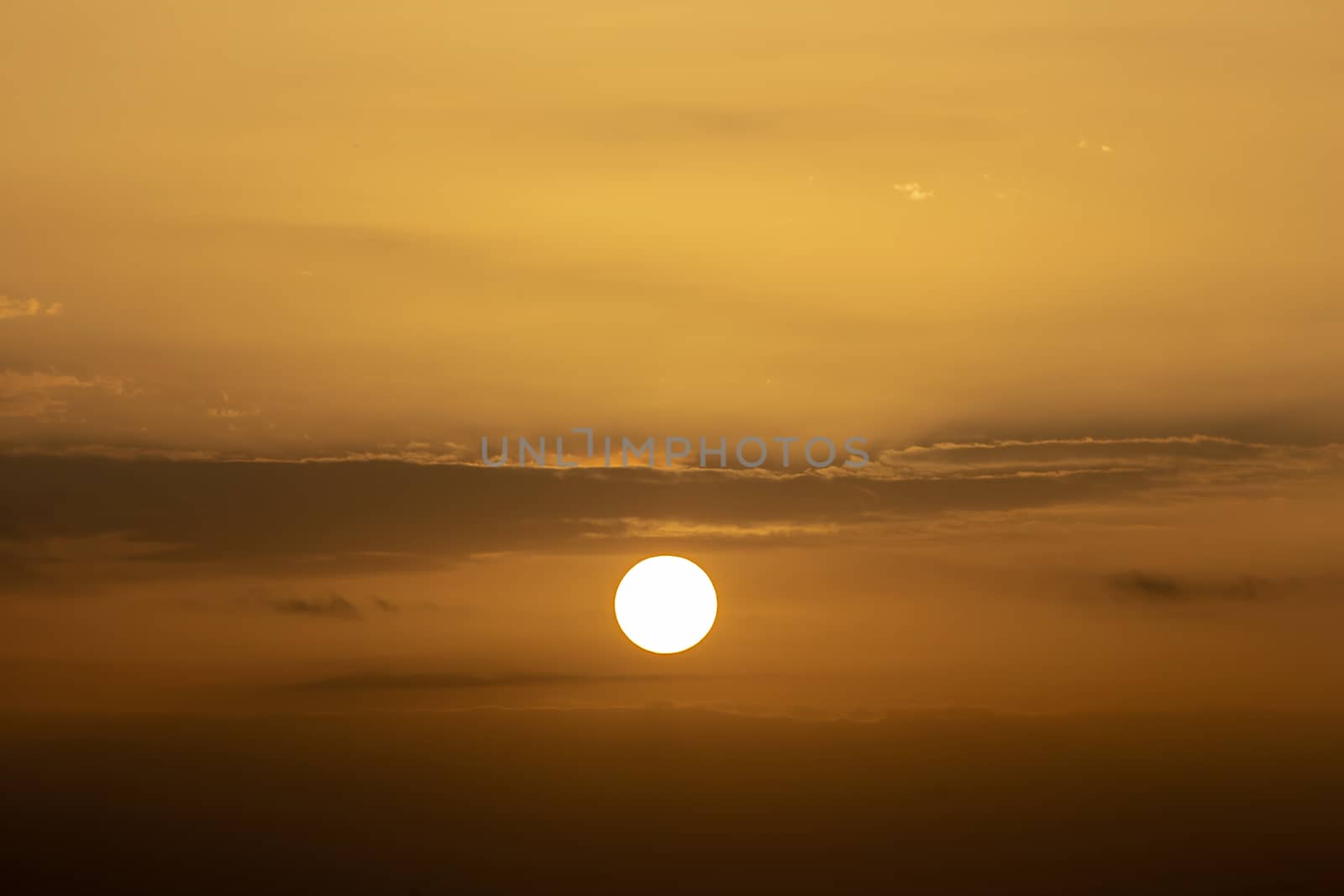 Colorful dramatic sky with cloud at sunset.Sky with sun backgrou by kaiskynet