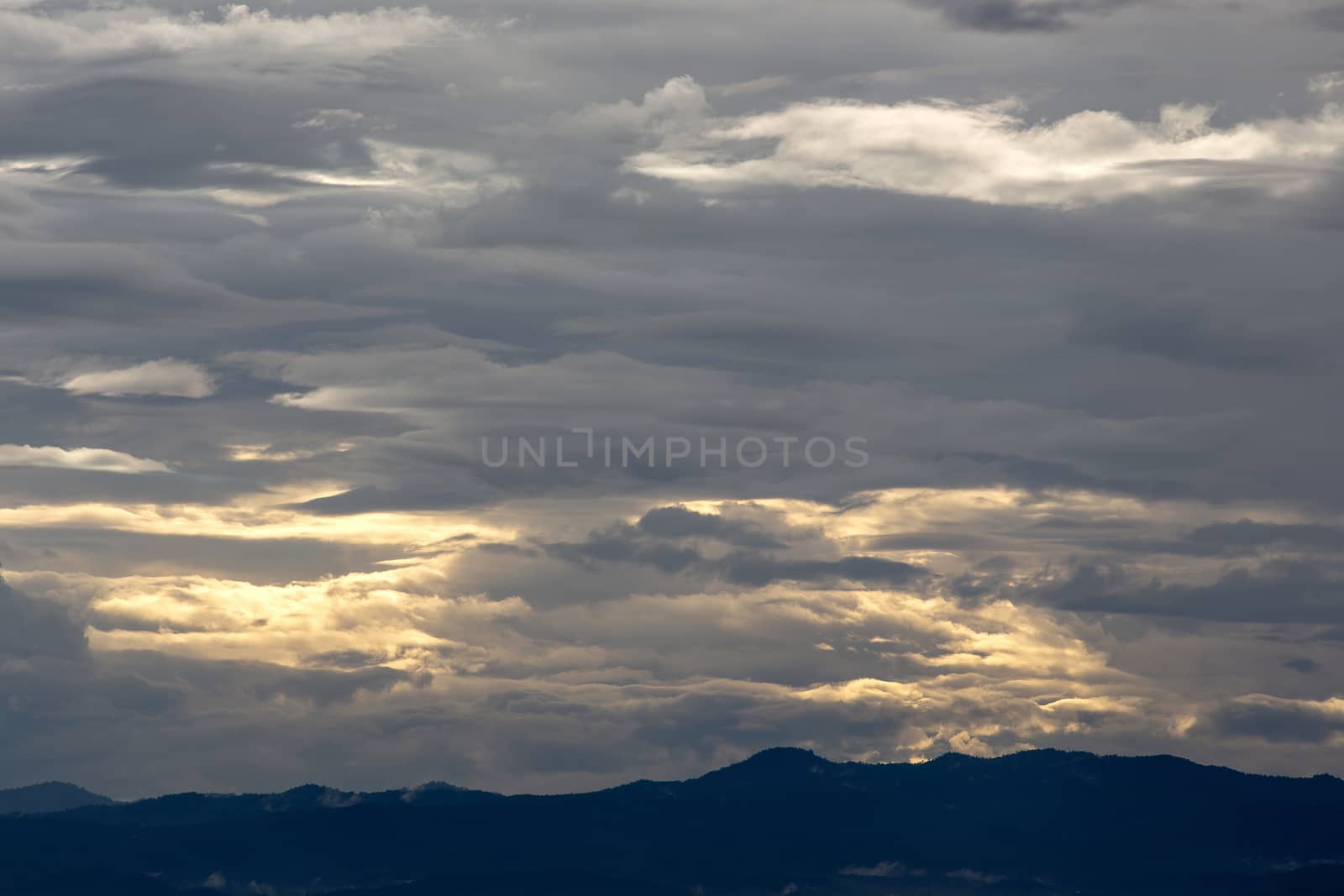 Colorful dramatic sky with cloud at sunset. by kaiskynet