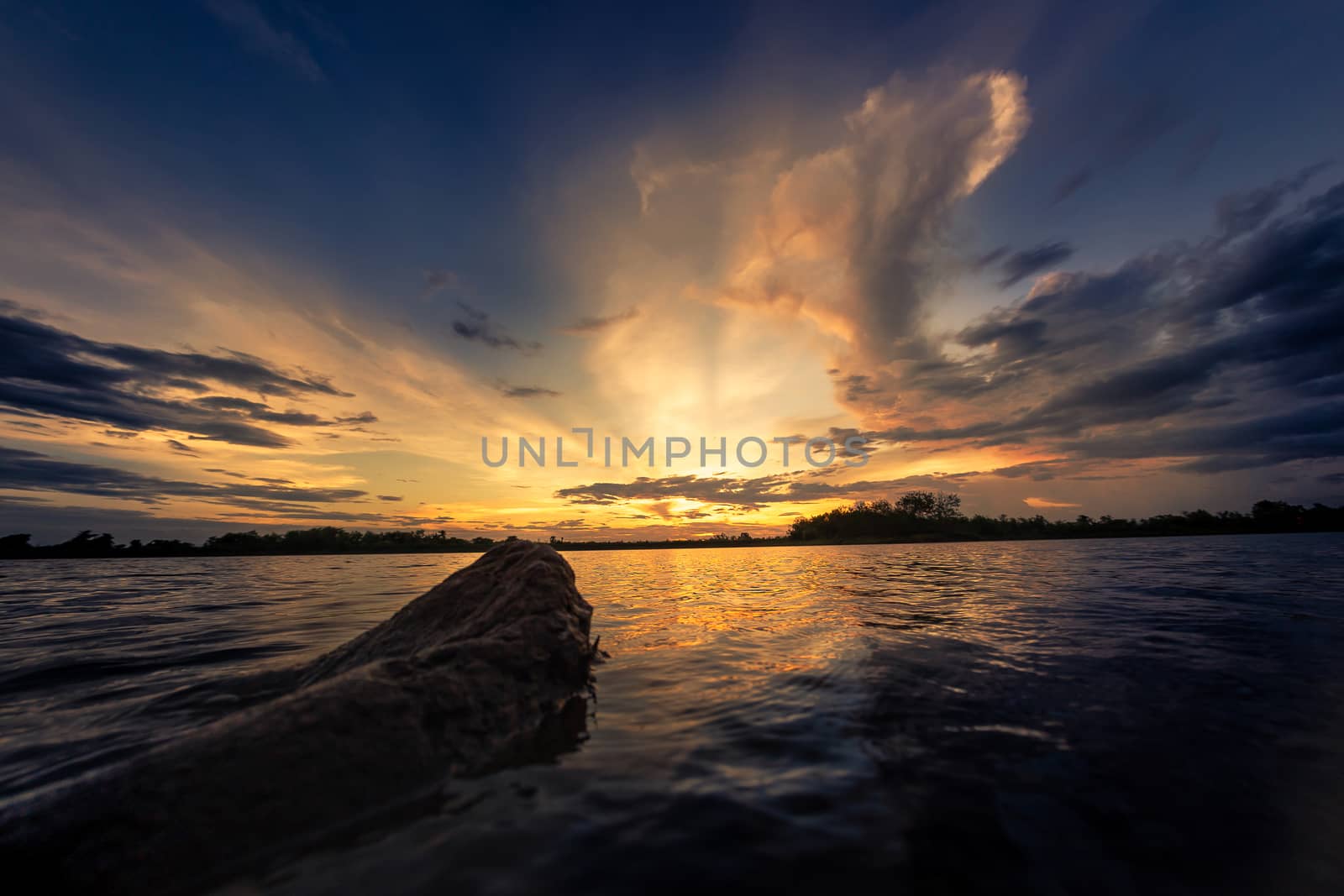 Colorful dramatic sky with cloud at sunset.Sky with sun backgrou by kaiskynet