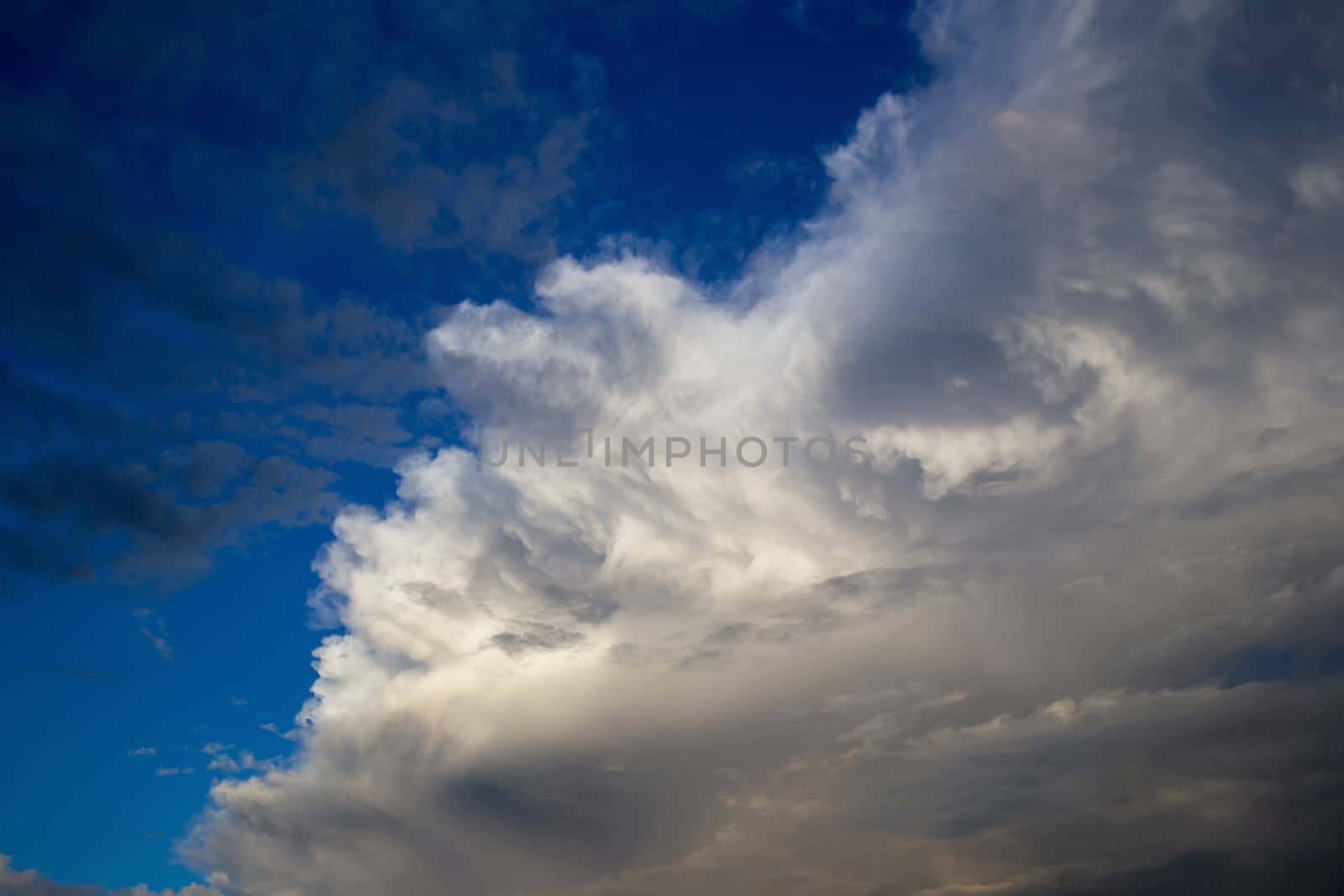 Colorful dramatic sky with cloud at sunset.