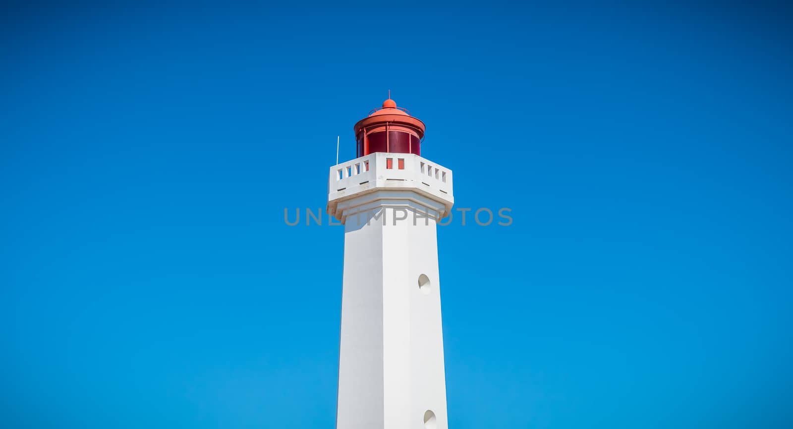 Port Joinville, France - September 17, 2018 - Architectural detail of the Corbeaux Marine Lighthouse on a summer day