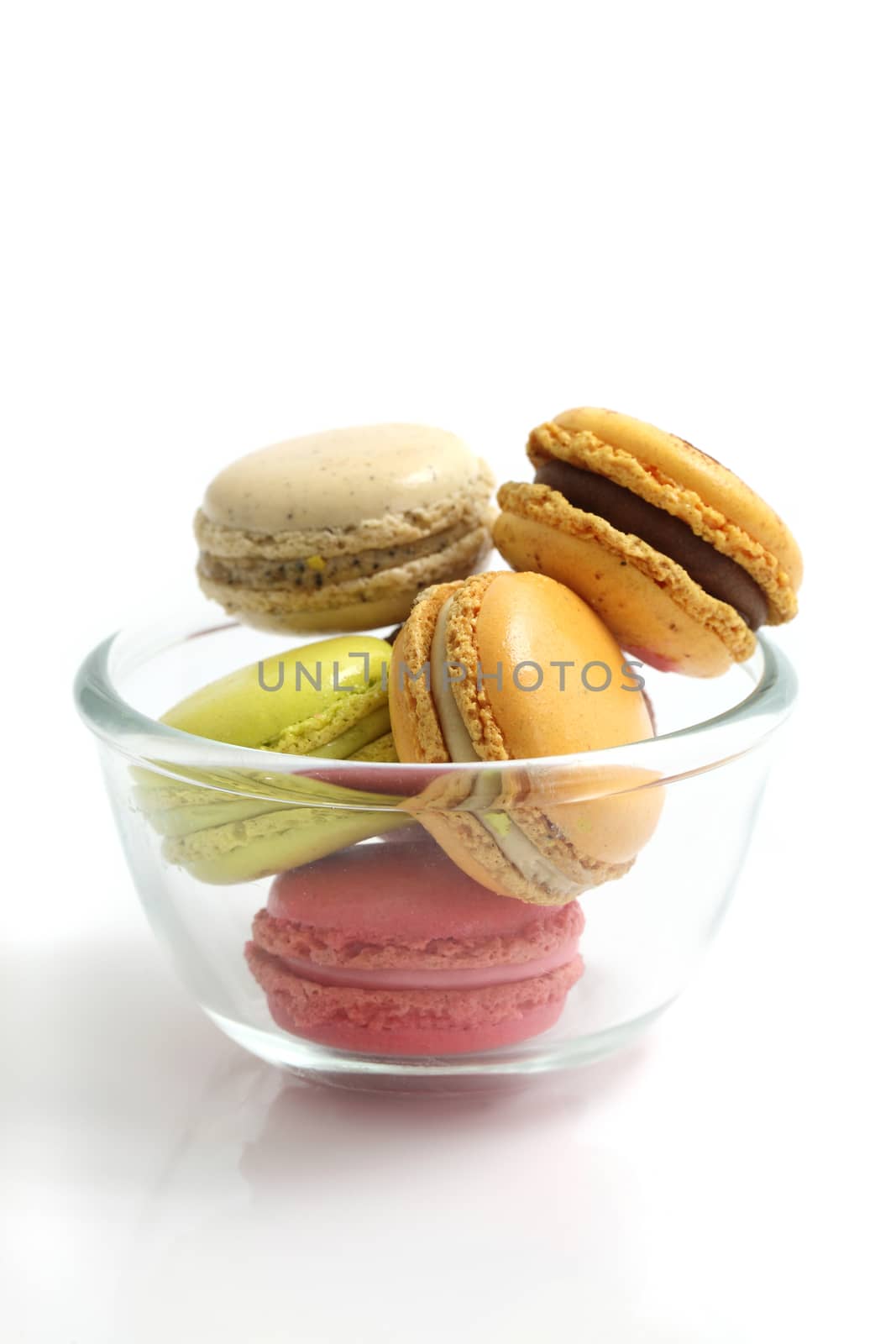 Colorful Macaron in close up isolated on white background