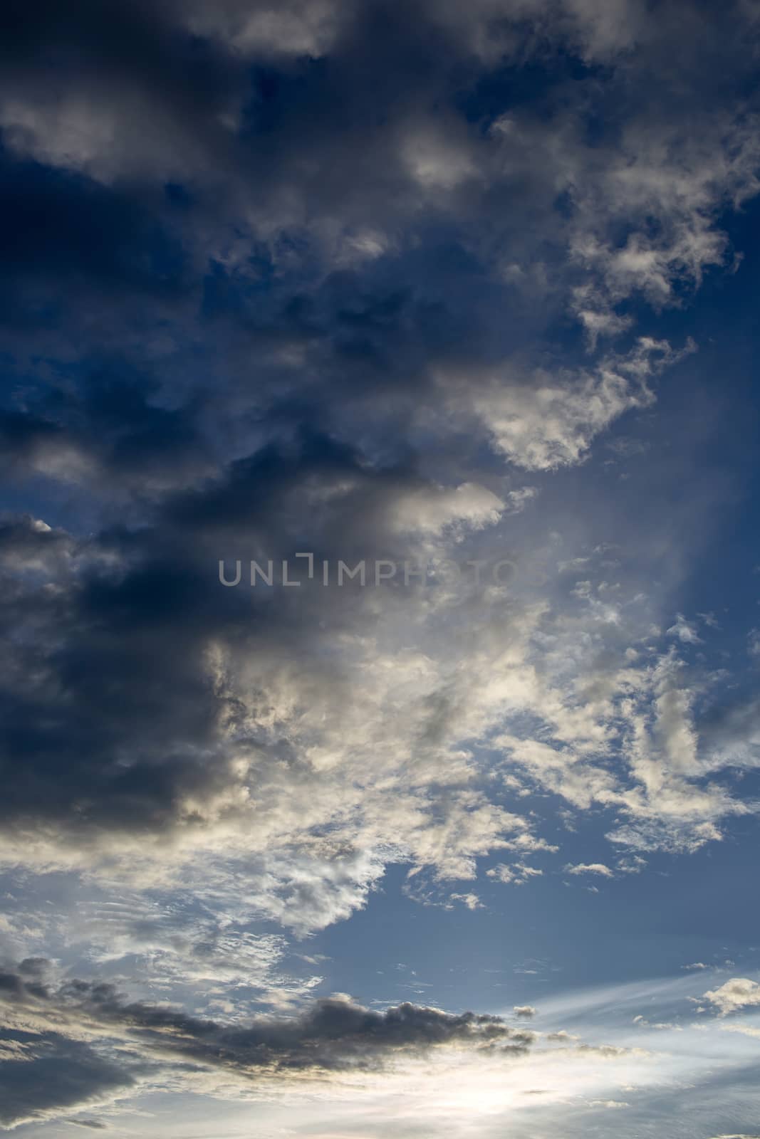 Colorful dramatic sky with cloud at sunset.