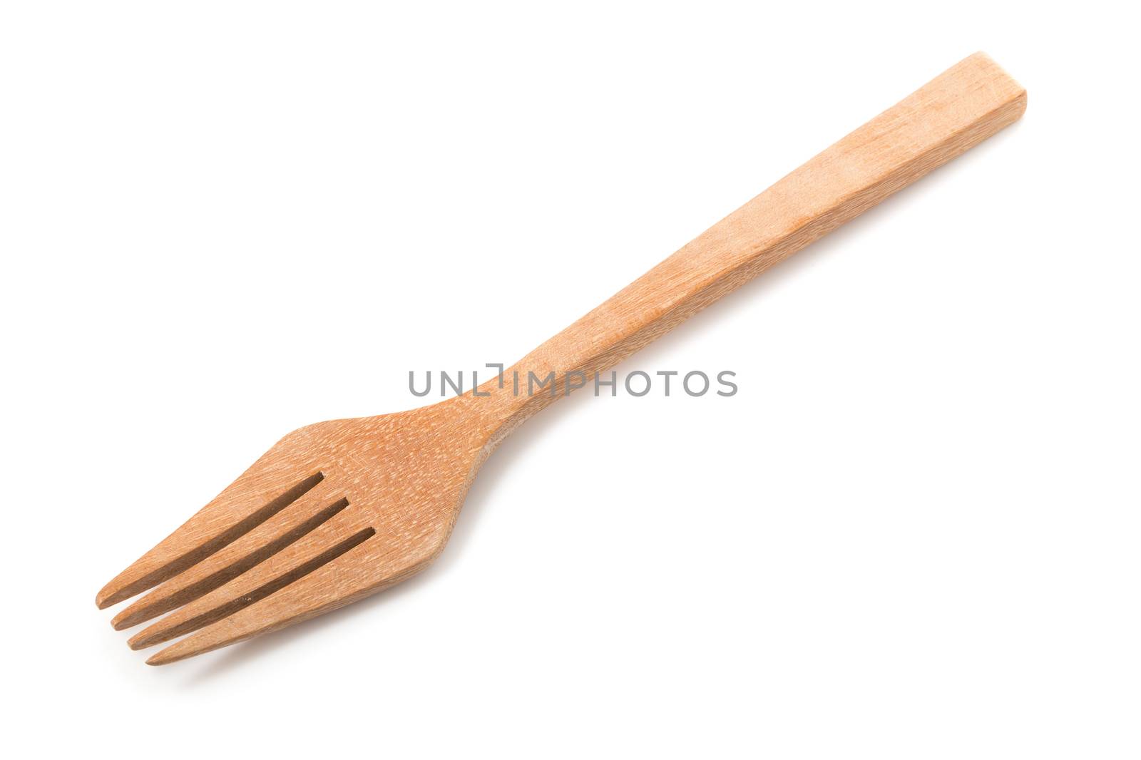 Wooden fork isolated on a white background by kaiskynet