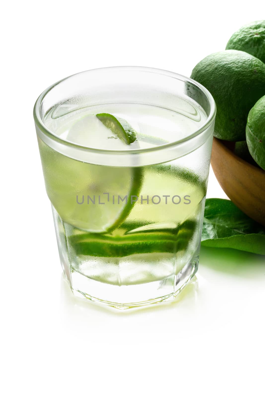 Lemon drink whit lime slices isolated on a white background