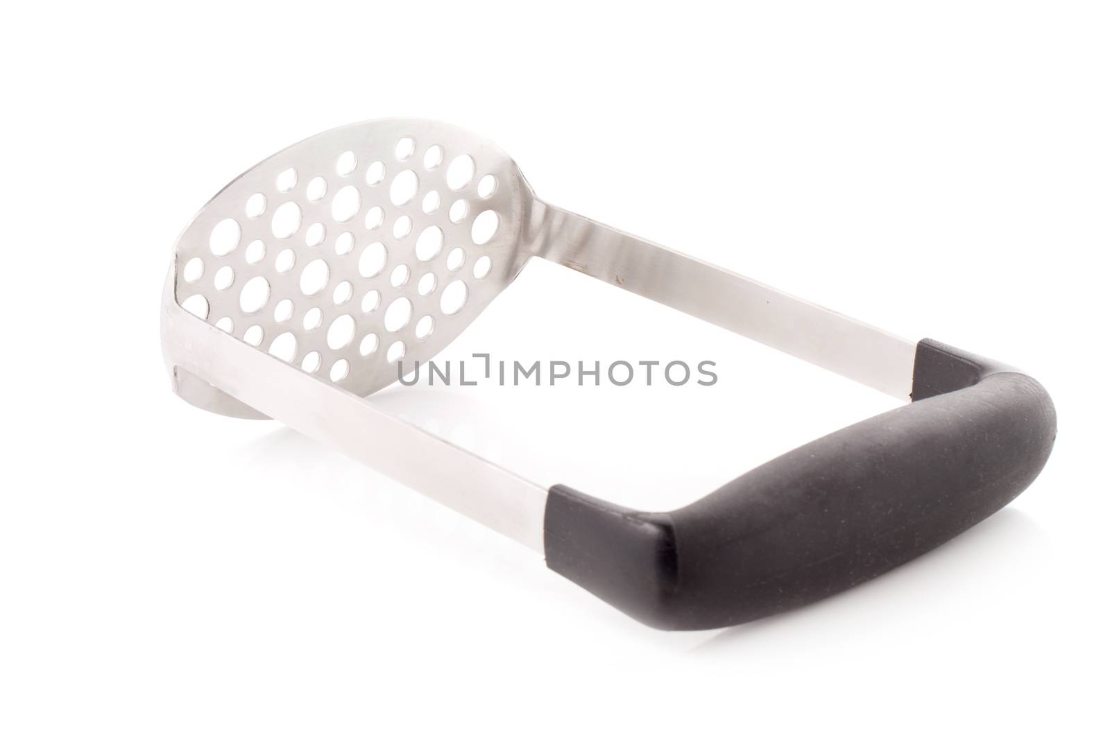 Metal potato masher isolated on a white background by kaiskynet