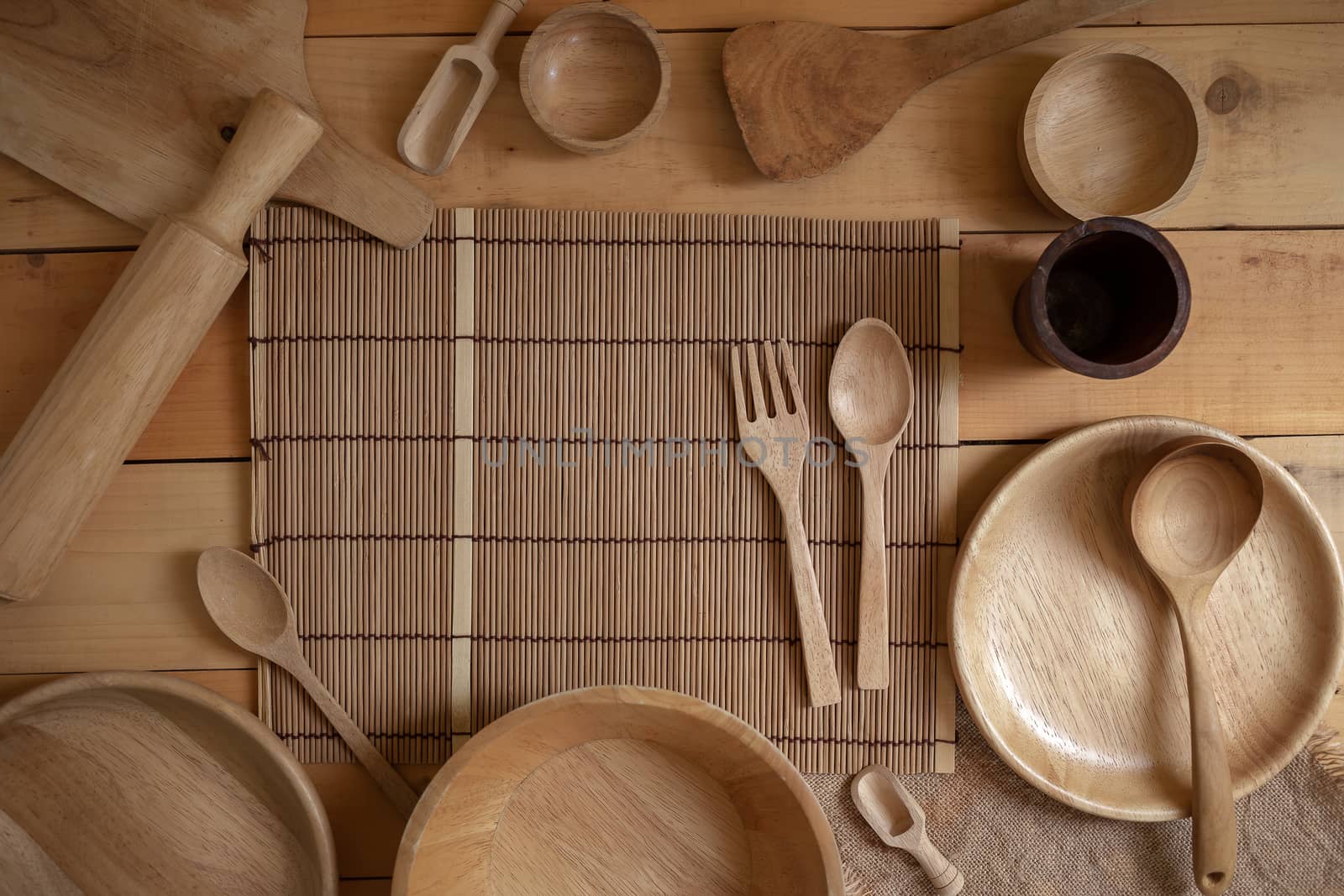 Wooden kitchenware on Natural pattern wood background. by kaiskynet