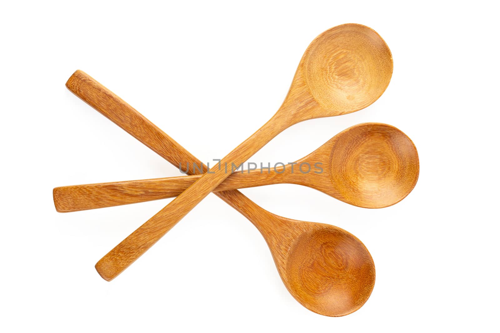 Wooden spoon isolated on a white background.