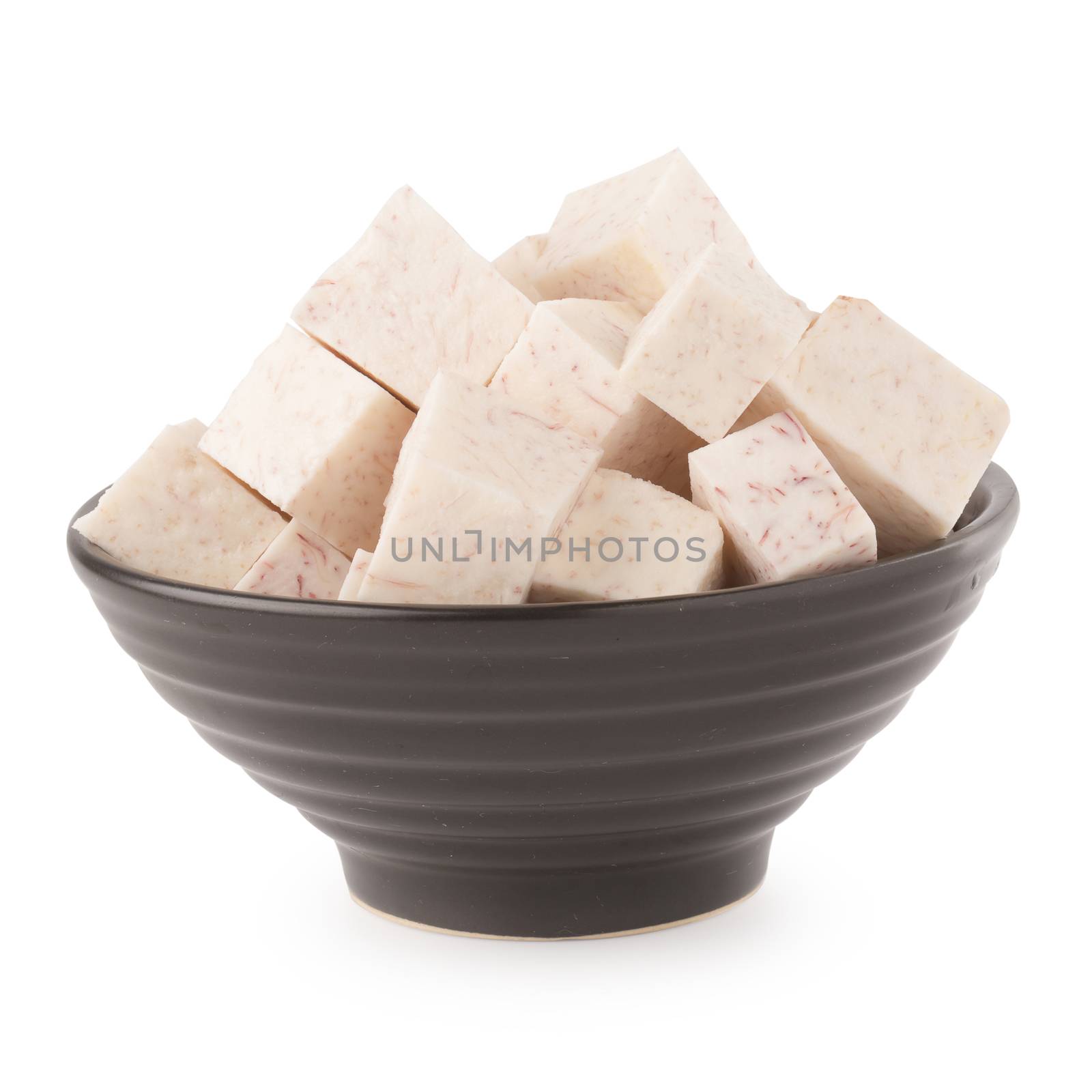 Black bowl of Cube taro root isolated on a white background.