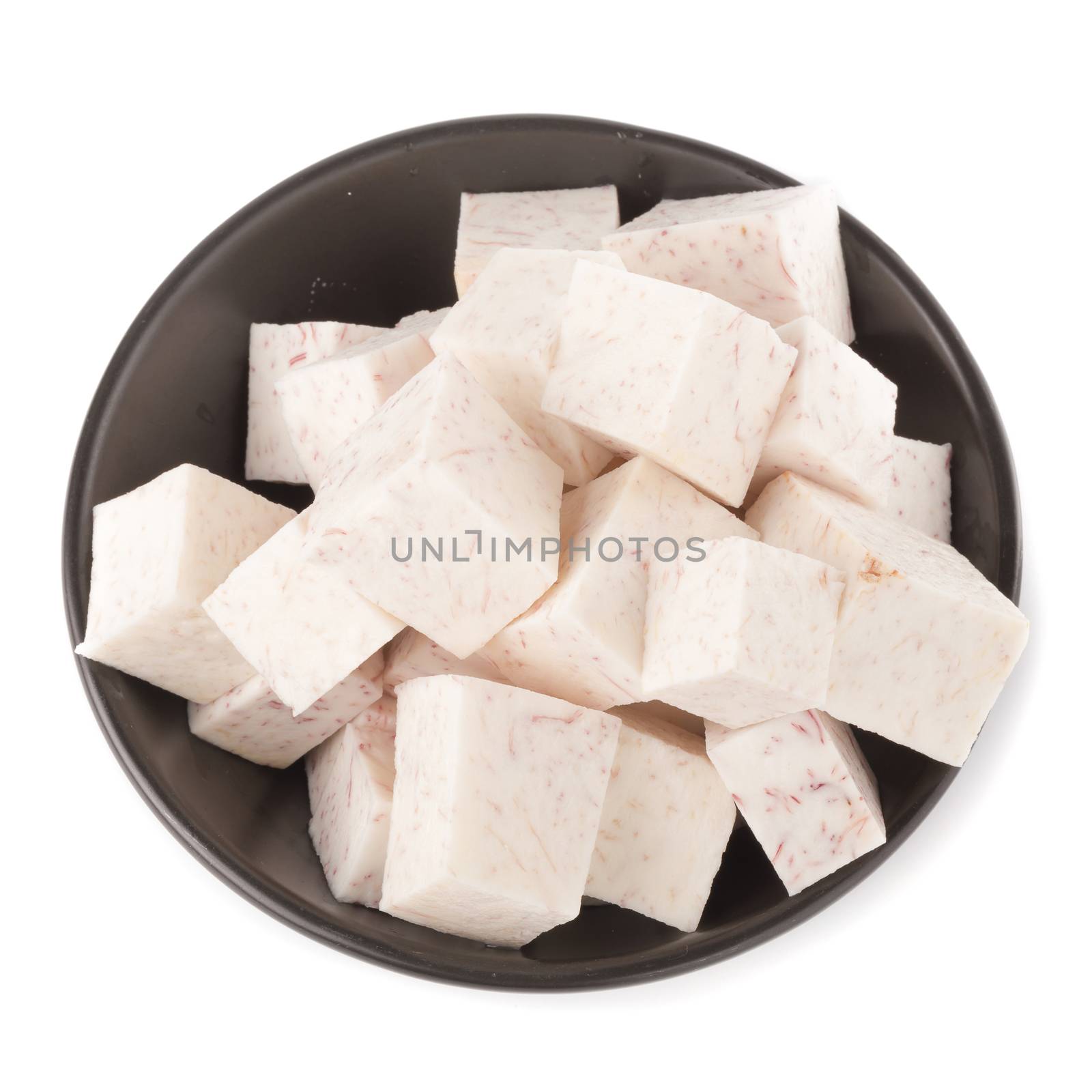 Black bowl of Cube taro root isolated on a white background.