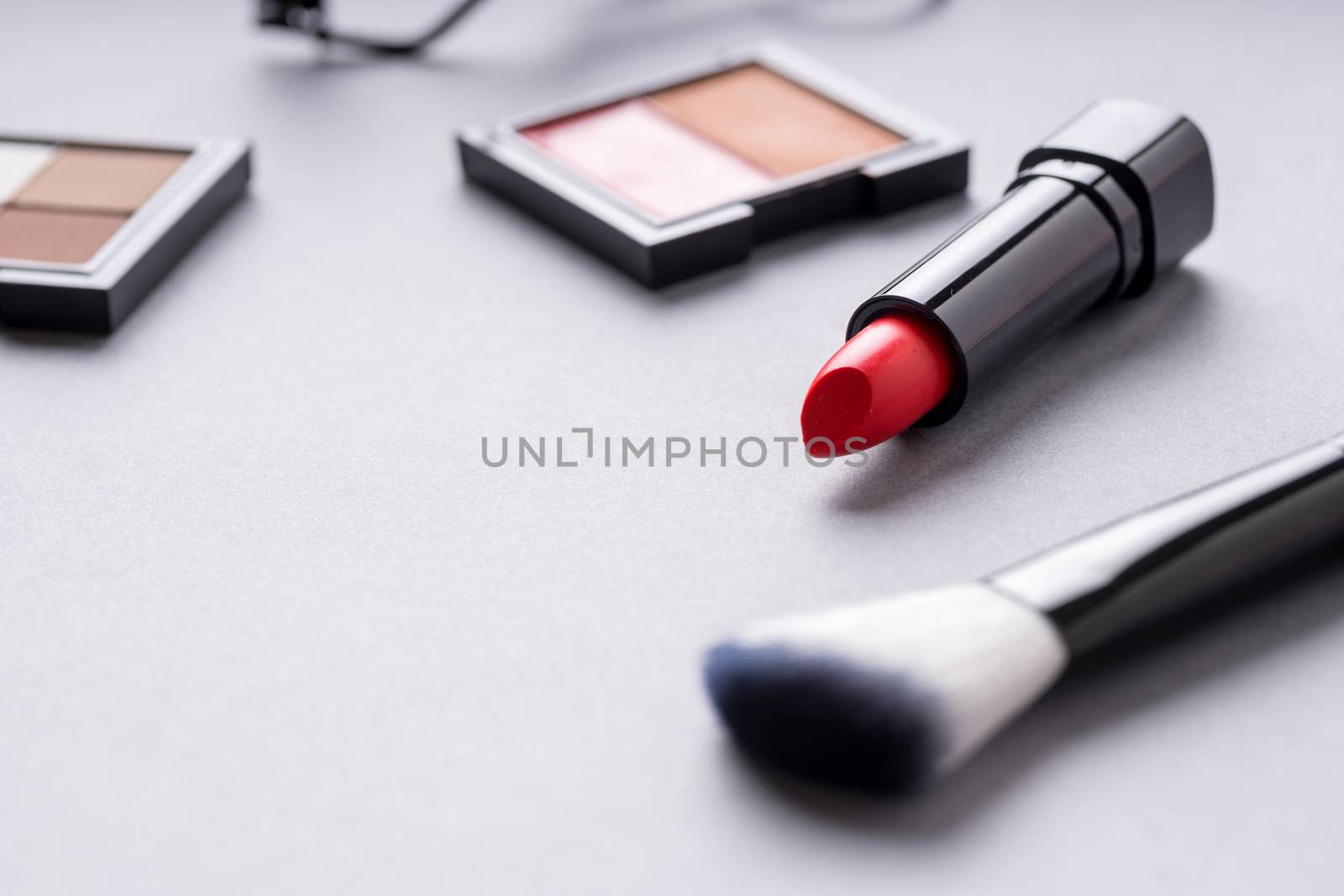 Set of Makeup cosmetics products with bag on top view by Alicephoto