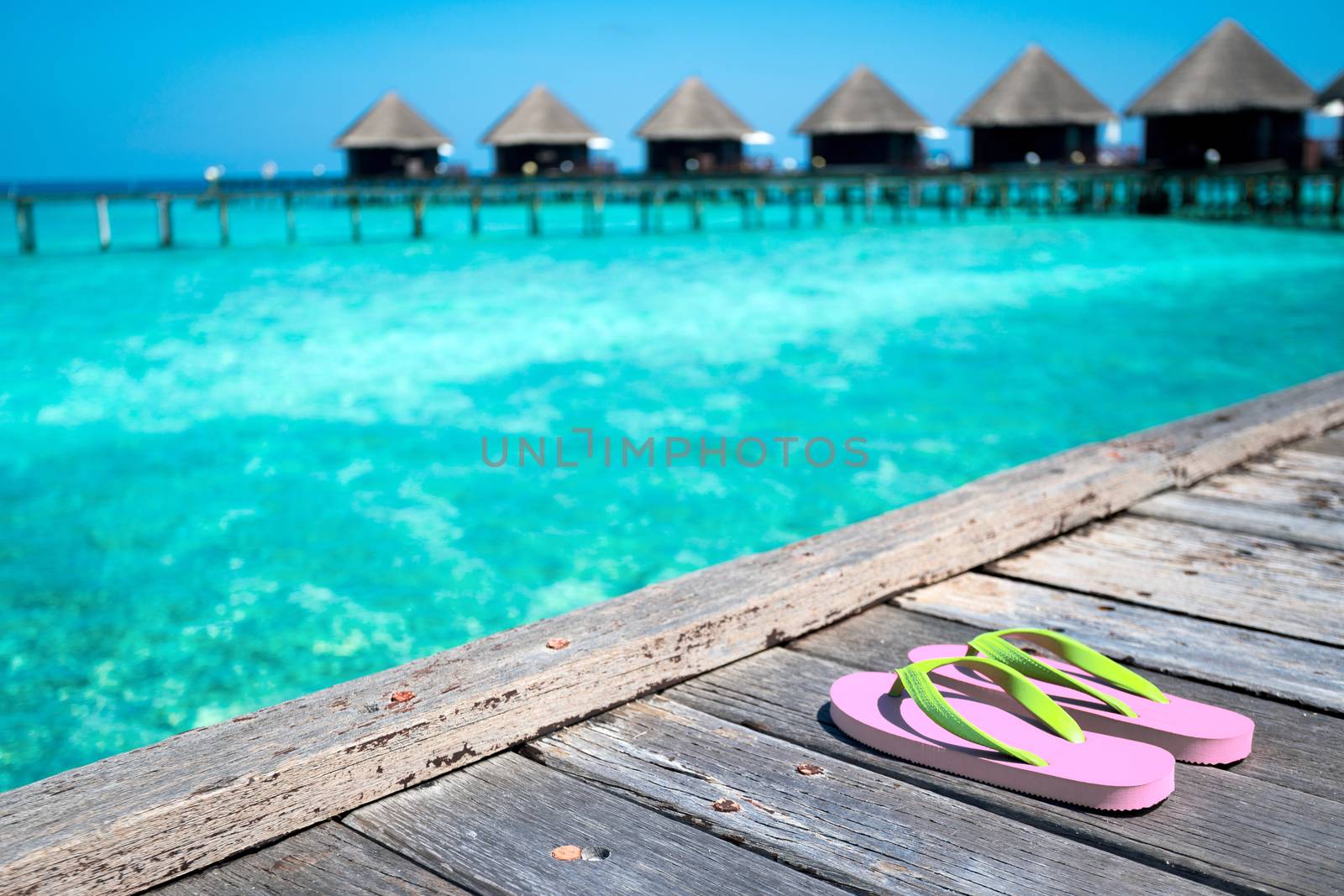 Sandals on the beautiful beach - summer vacation by Alicephoto