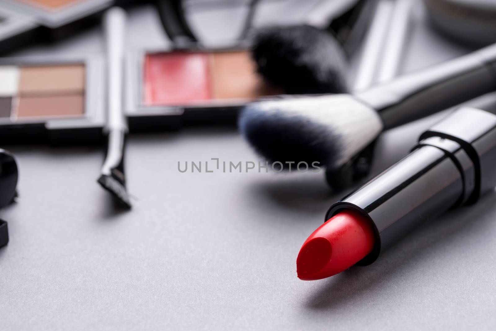 Set of Makeup cosmetics products with bag on top view by Alicephoto