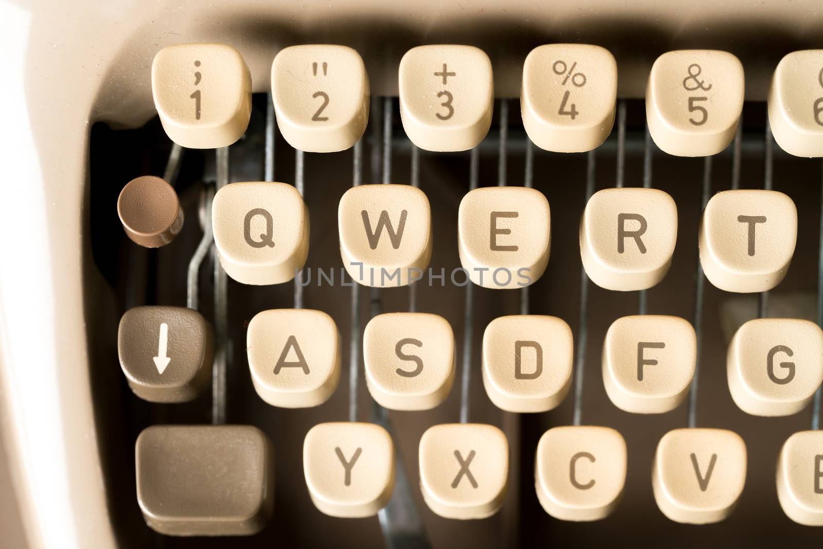 Close up of retro style typewriter in studio by Alicephoto