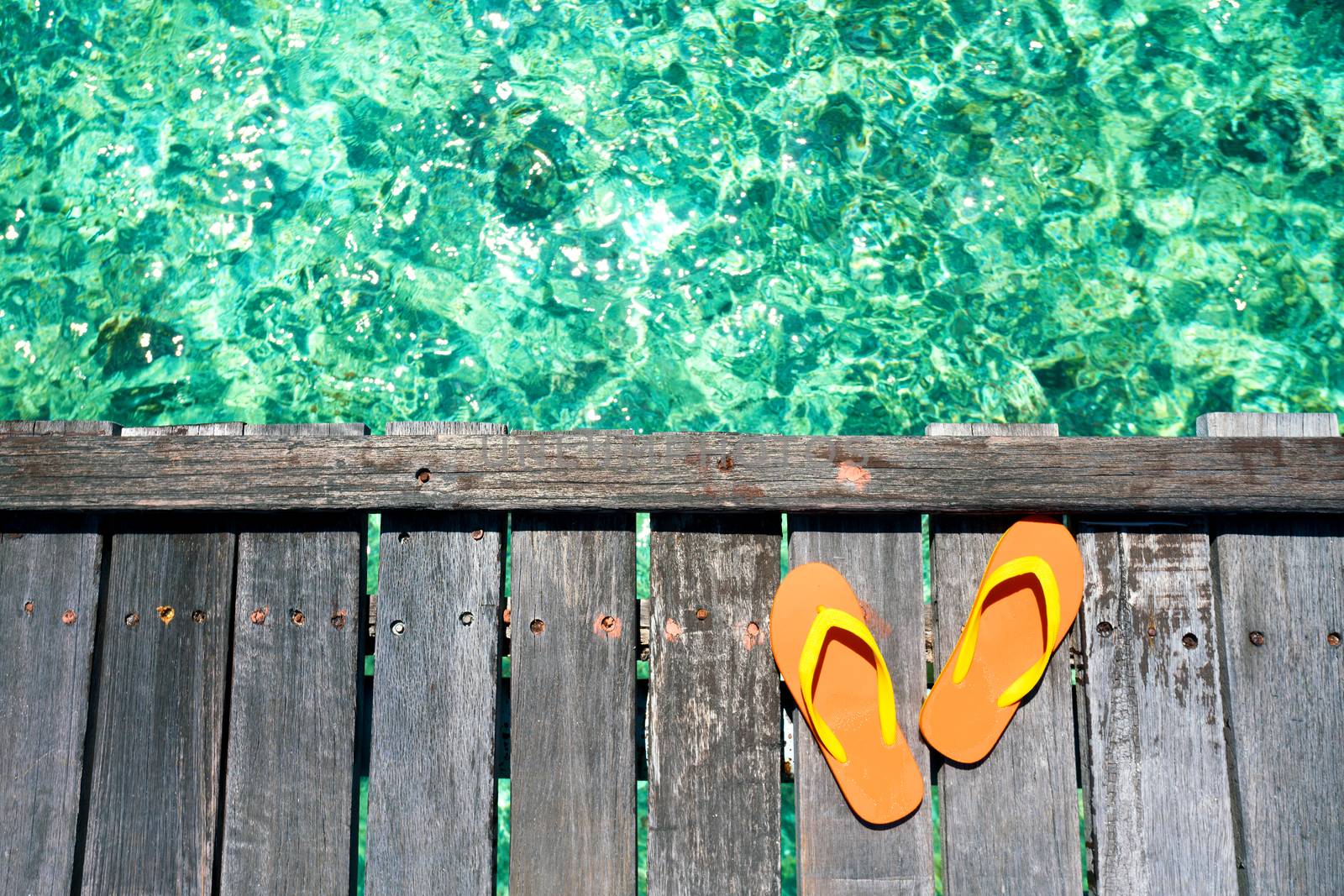 Sandals on the beautiful beach - summer vacation by Alicephoto