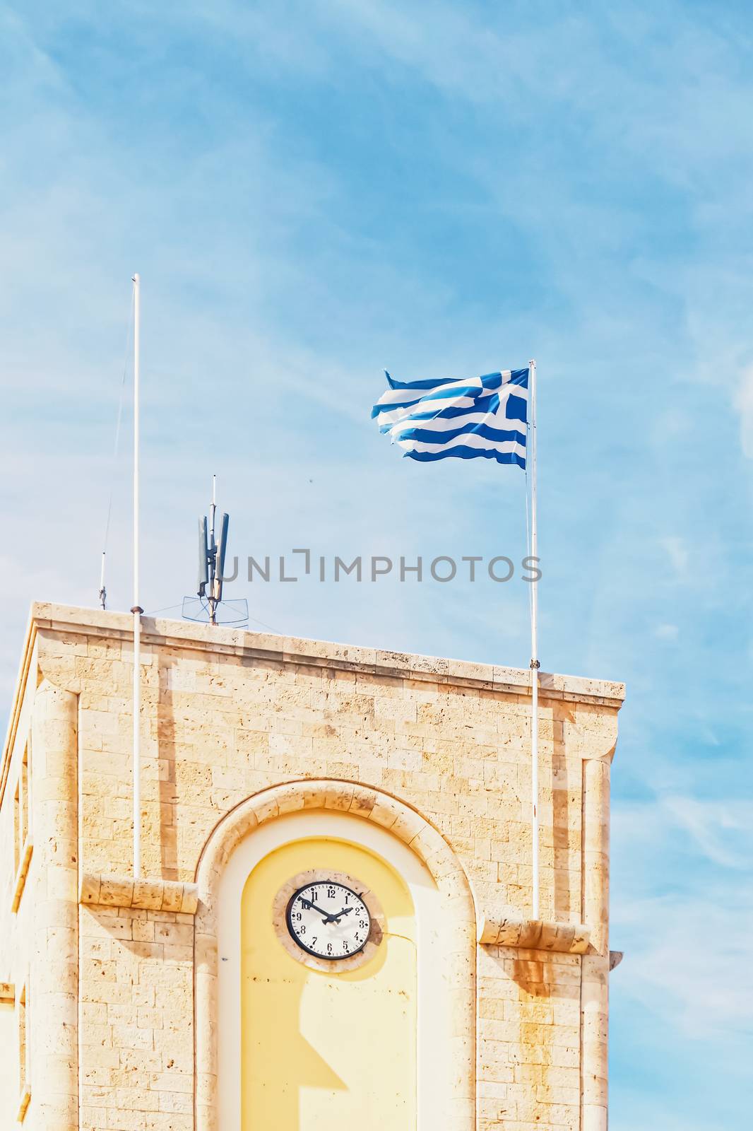 Greek flag and blue sky, travel and politics by Anneleven