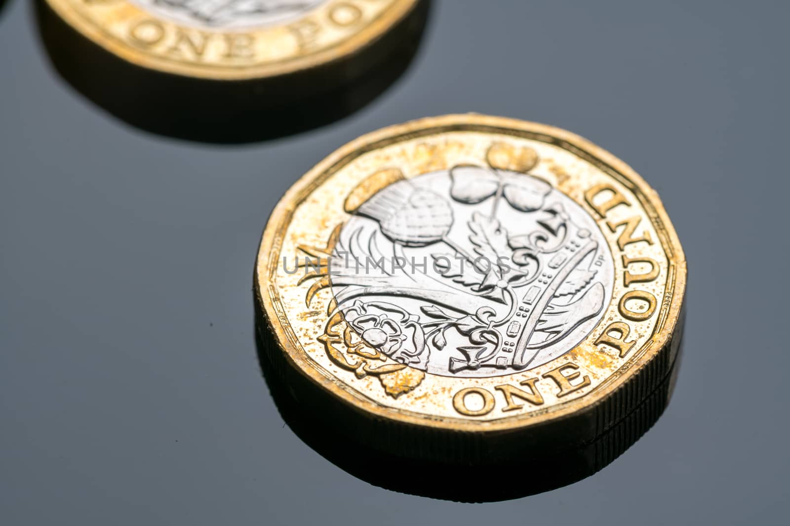 New British one pound coin in studio by Alicephoto