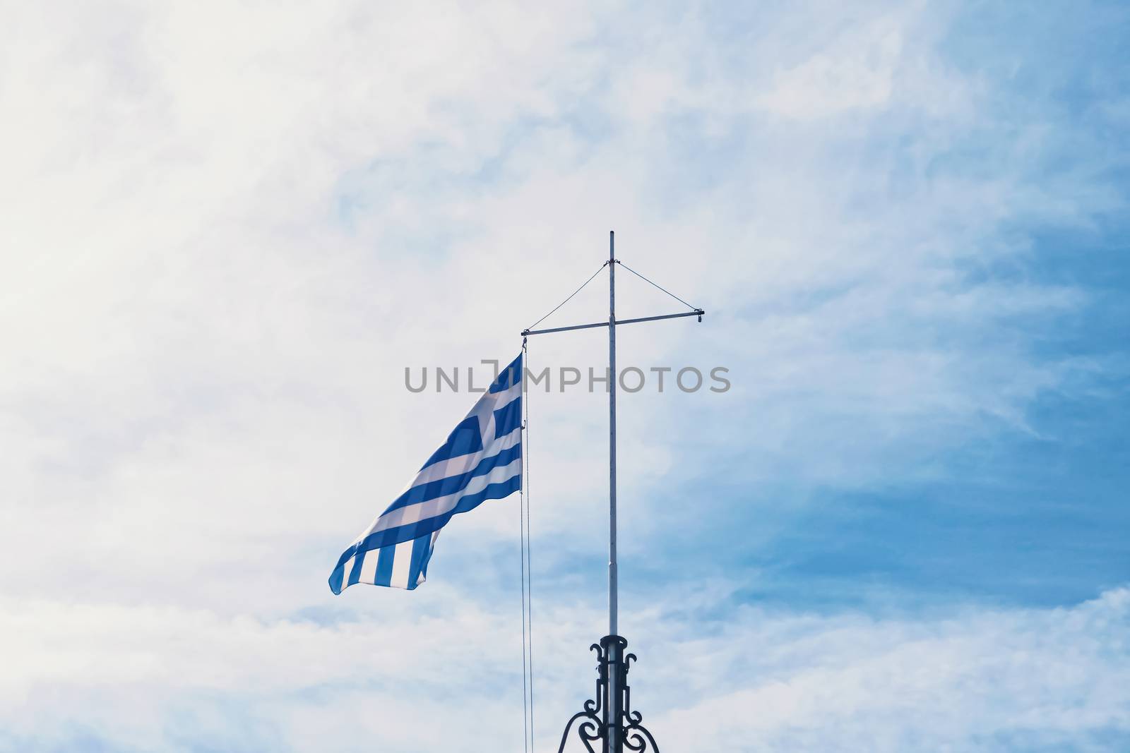 Greek flag and blue sky, travel and politics concept