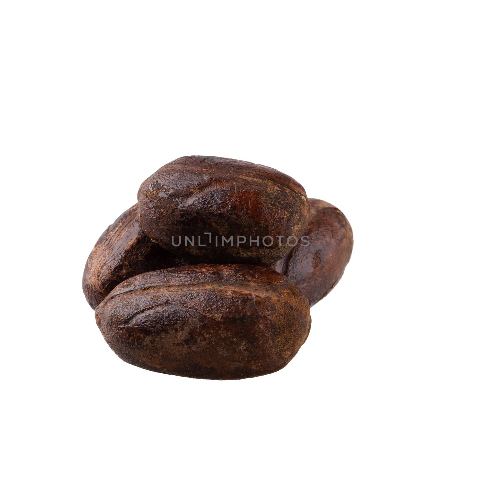 Dry nutmeg spice isolated on a white background by kaiskynet