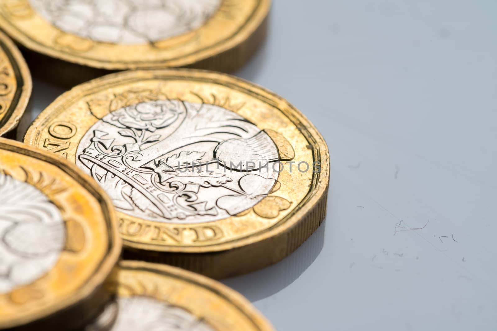 New British one pound coin in studio by Alicephoto
