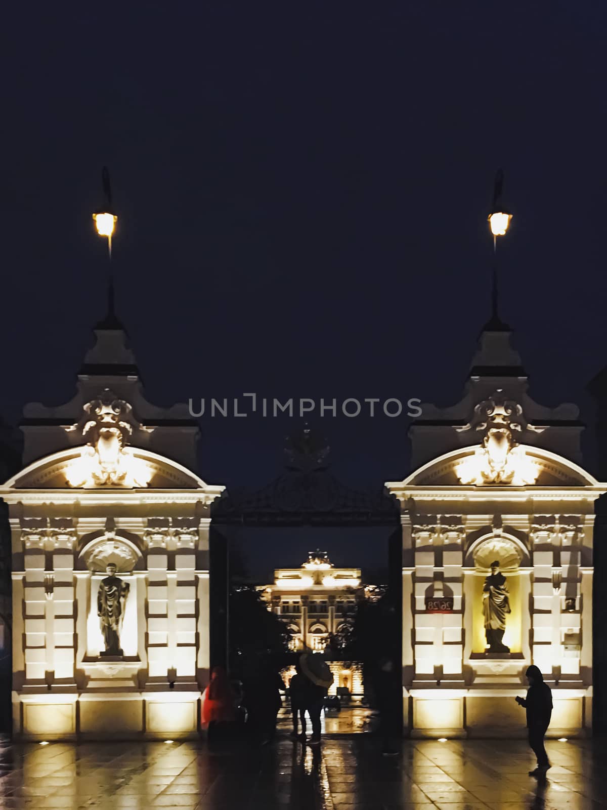 Exterior facade of classic building in the European city at night, architecture and design by Anneleven