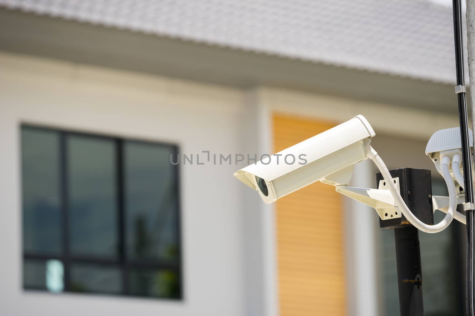 CCTV camera in home village by Alicephoto