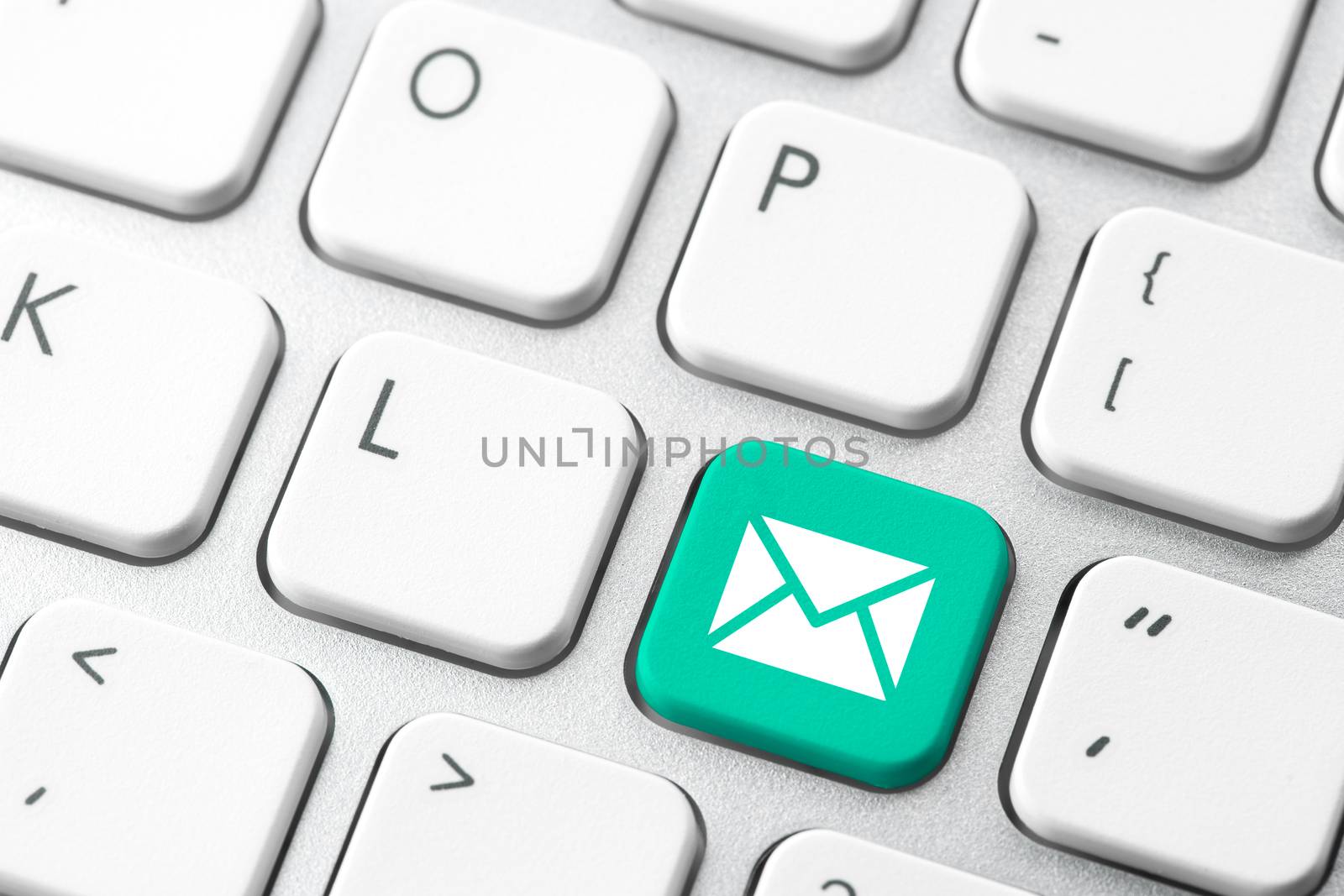 Email & contact us icon on computer keyboard by Alicephoto