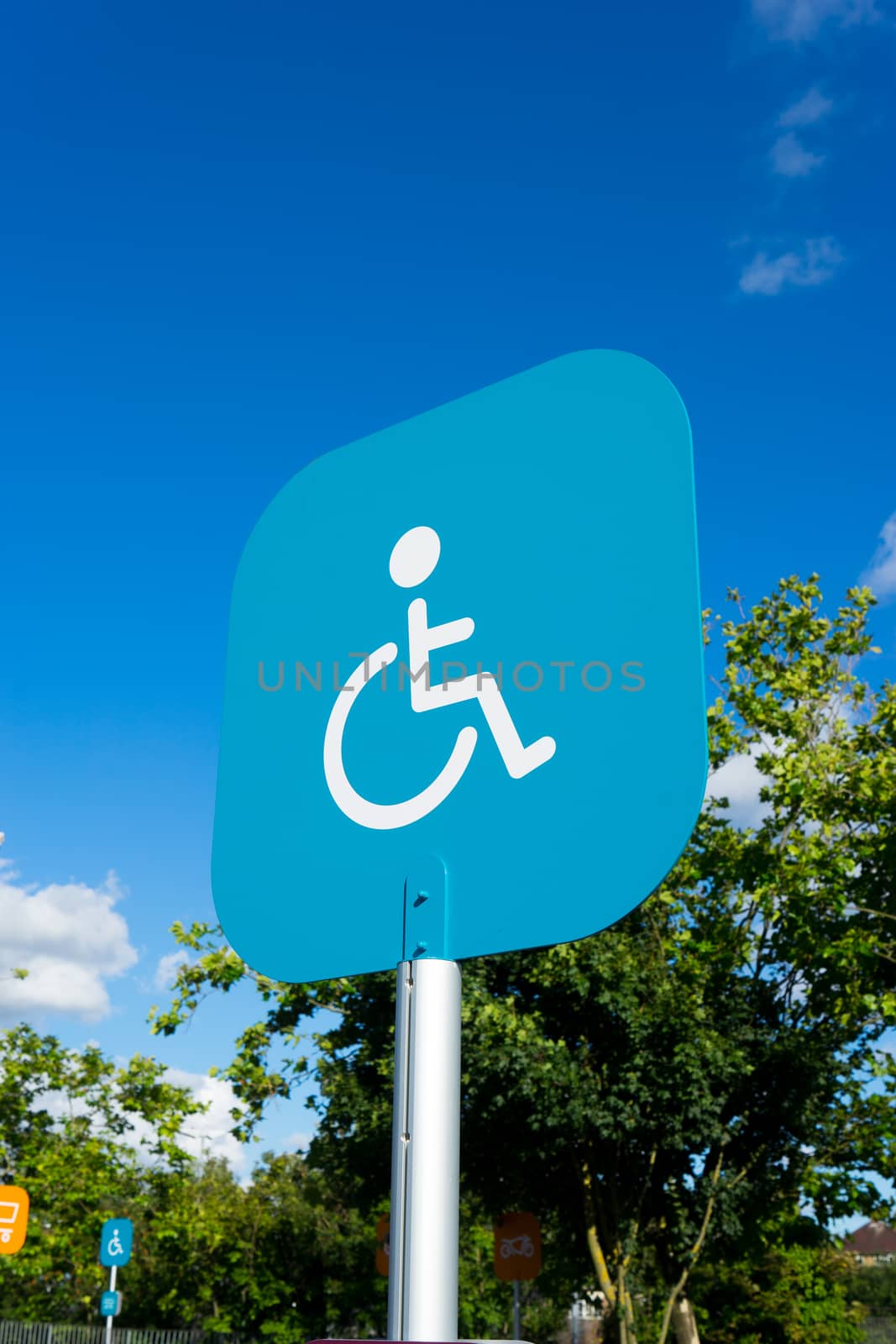 Disability sign parking outdoor by Alicephoto