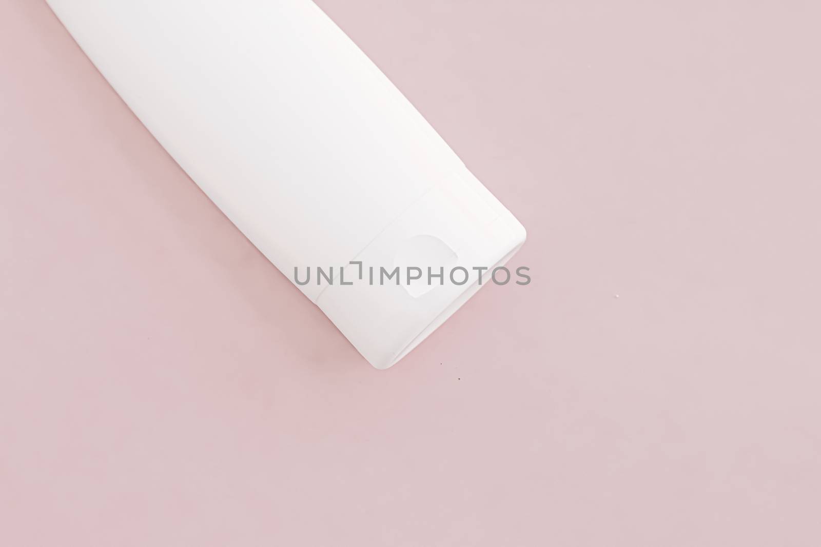 Moisturizing hand cream or body lotion on pink background, beauty product and skin care cosmetics by Anneleven