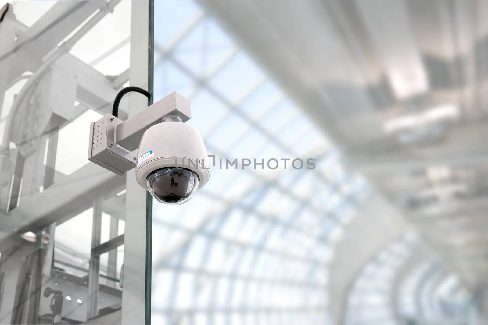 Security CCTV camera by Alicephoto
