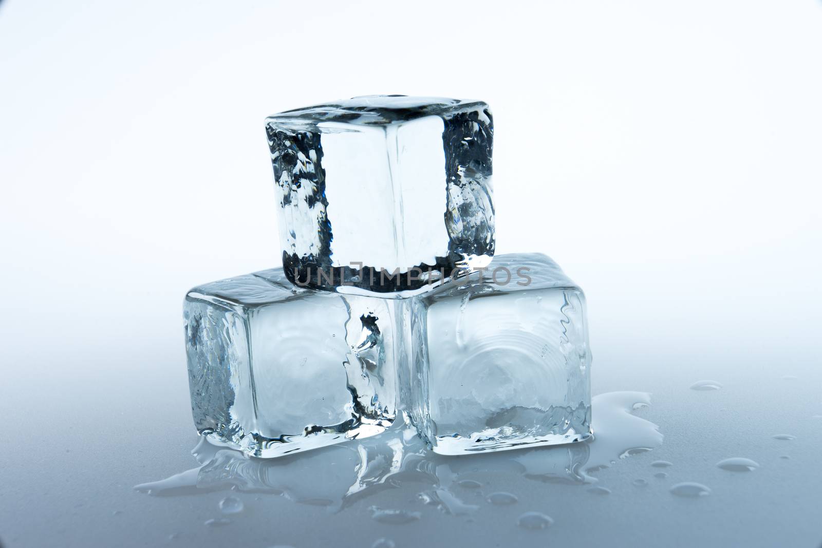 ice cubes on white background

 by Alicephoto