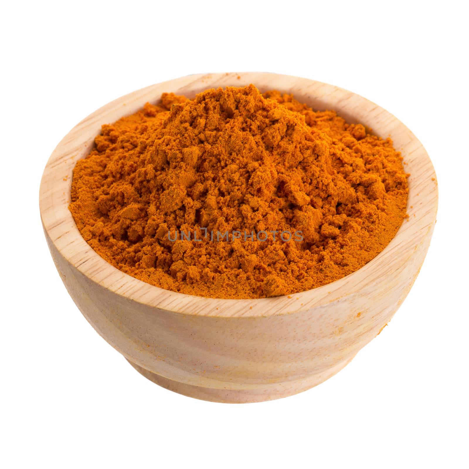 Turmeric powder in wooden bowl on white background by kaiskynet