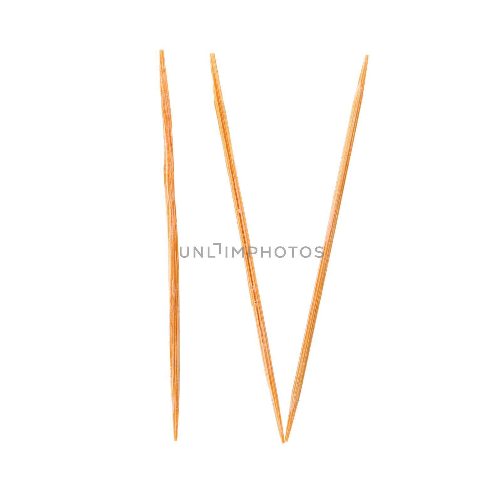 Toothpicks isolated on white. and Old roman antique alphabet num by kaiskynet